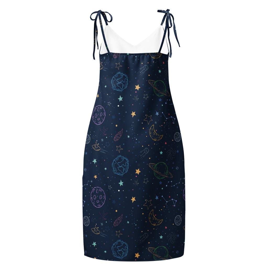 Navy blue dress with celestial pattern on a white background