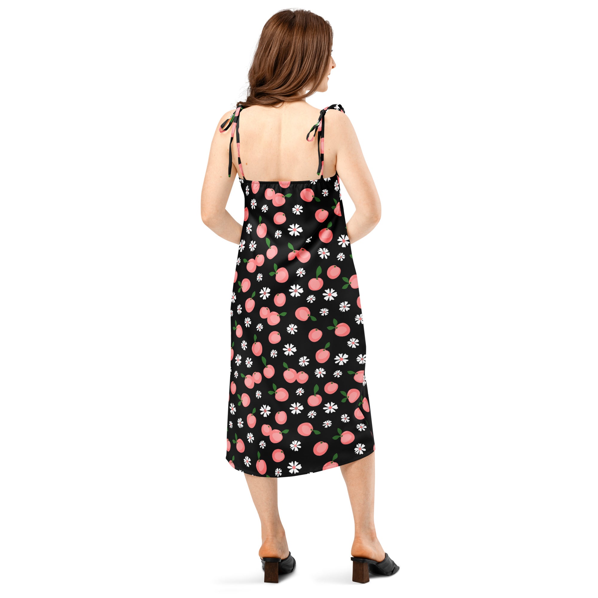 Women’s black midi slip dress with pink cherry white daisy prints featuring adjustable tie-back straps and built-in bra