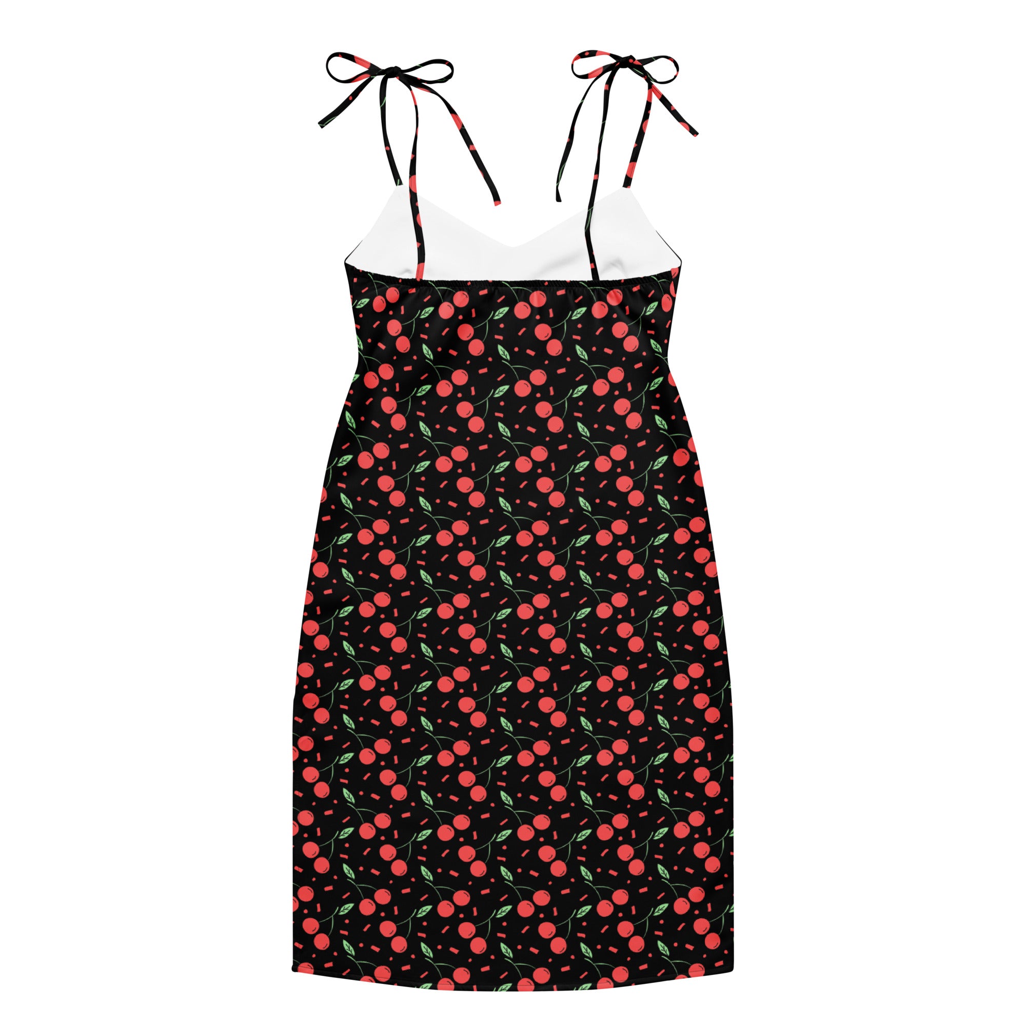 Women’s black mini cherry slip dress with red cherry print, adjustable tie straps, and built-in bra on dark background