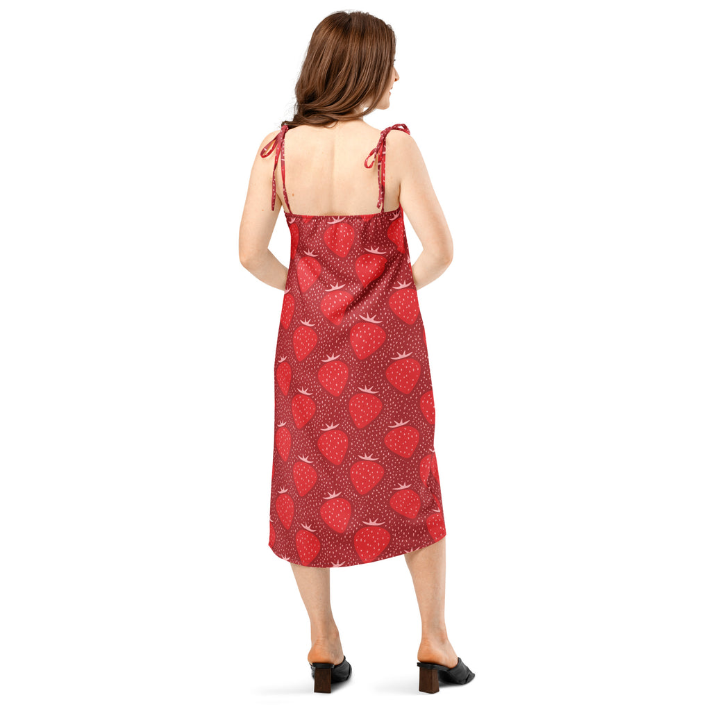 Women’s red strawberry midi slip dress with adjustable tie-back straps and built-in bra shown from the back side
