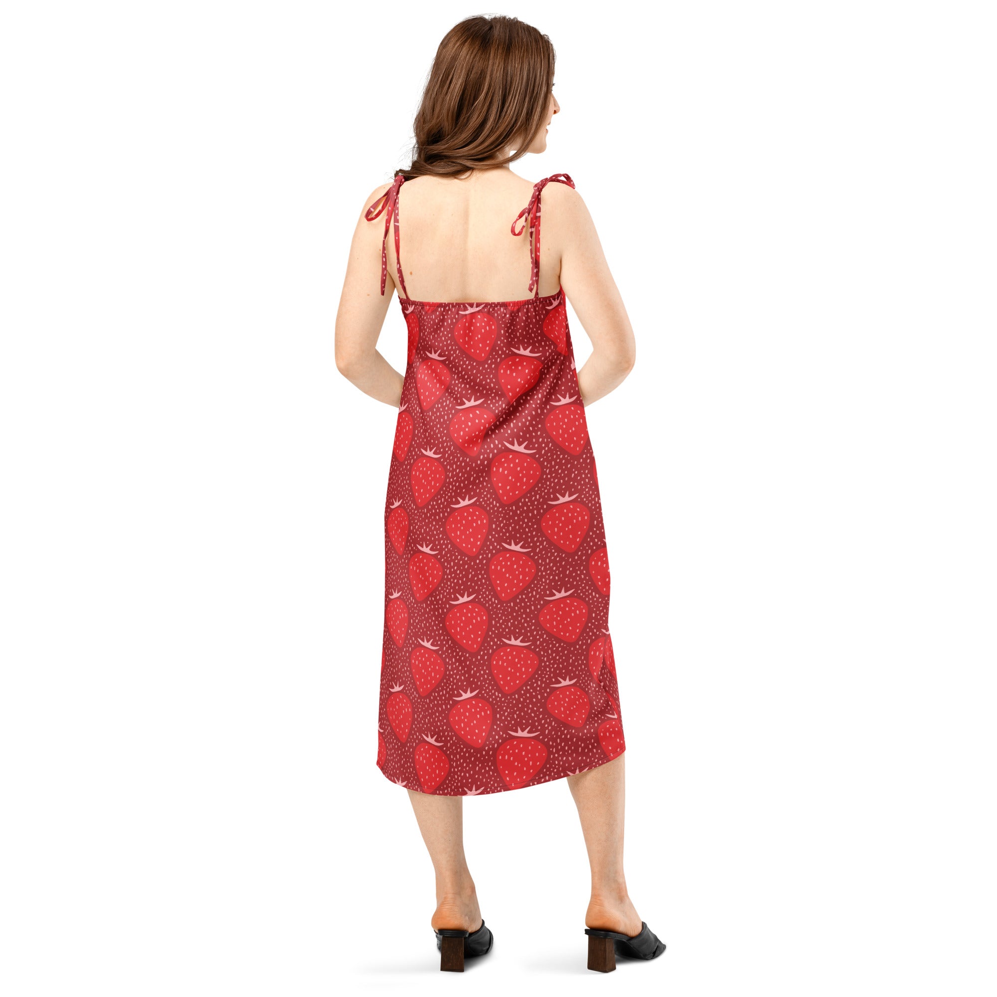 Women’s red strawberry midi slip dress with adjustable tie-back straps and built-in bra shown from the back side