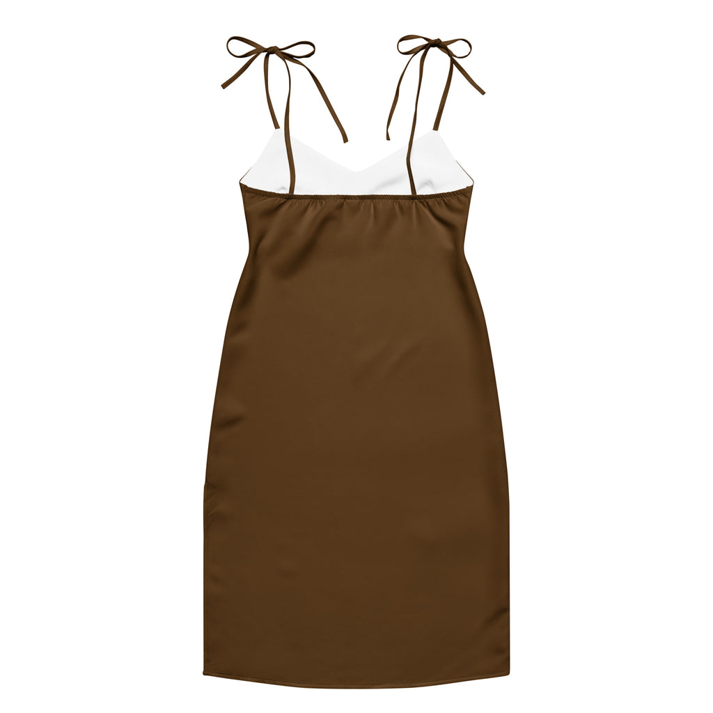 Women's brown slip dress with adjustable tie straps and built-in bra, midi length.