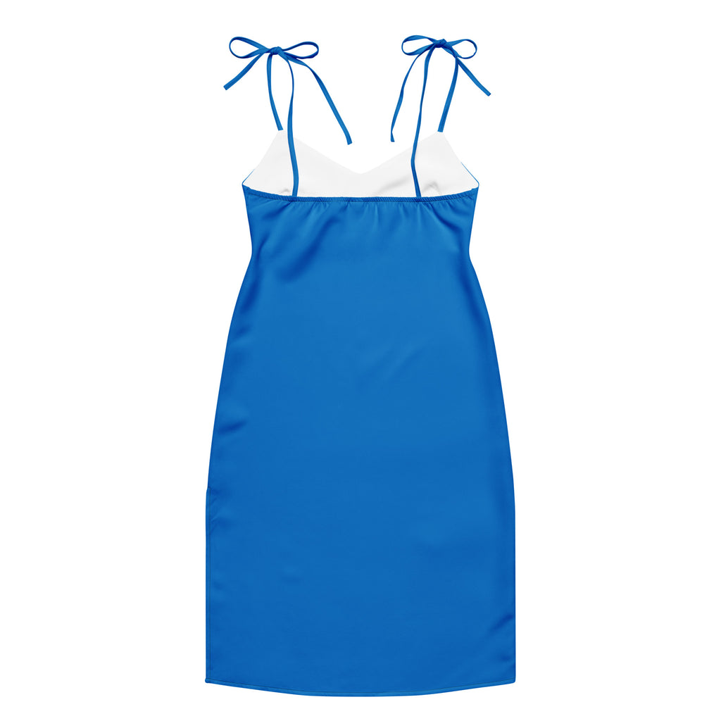 Women's blue slip dress with adjustable tie straps and built-in bra, midi length.