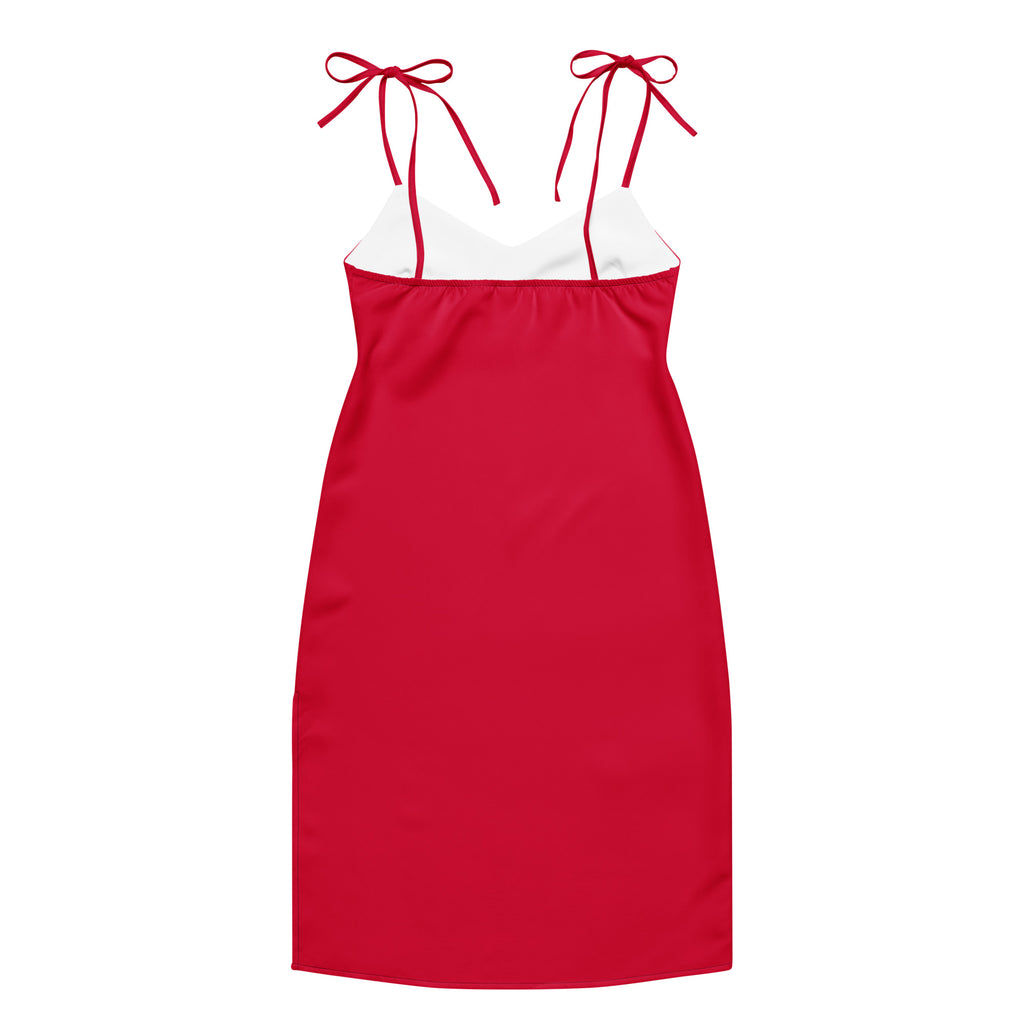 Red slip dress with white lace trim on a white background