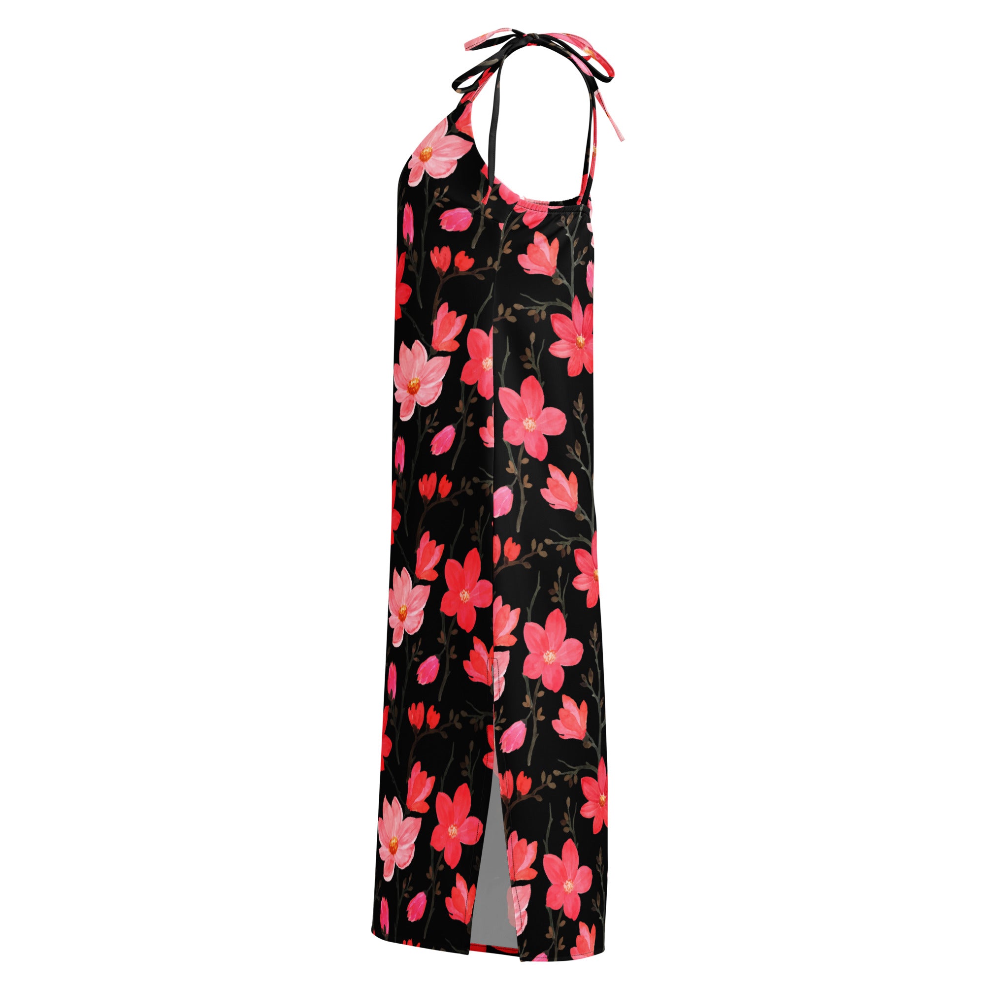 A black halter-neck maxi dress with vibrant pink and coral floral pattern and delicate tie straps at the neckline