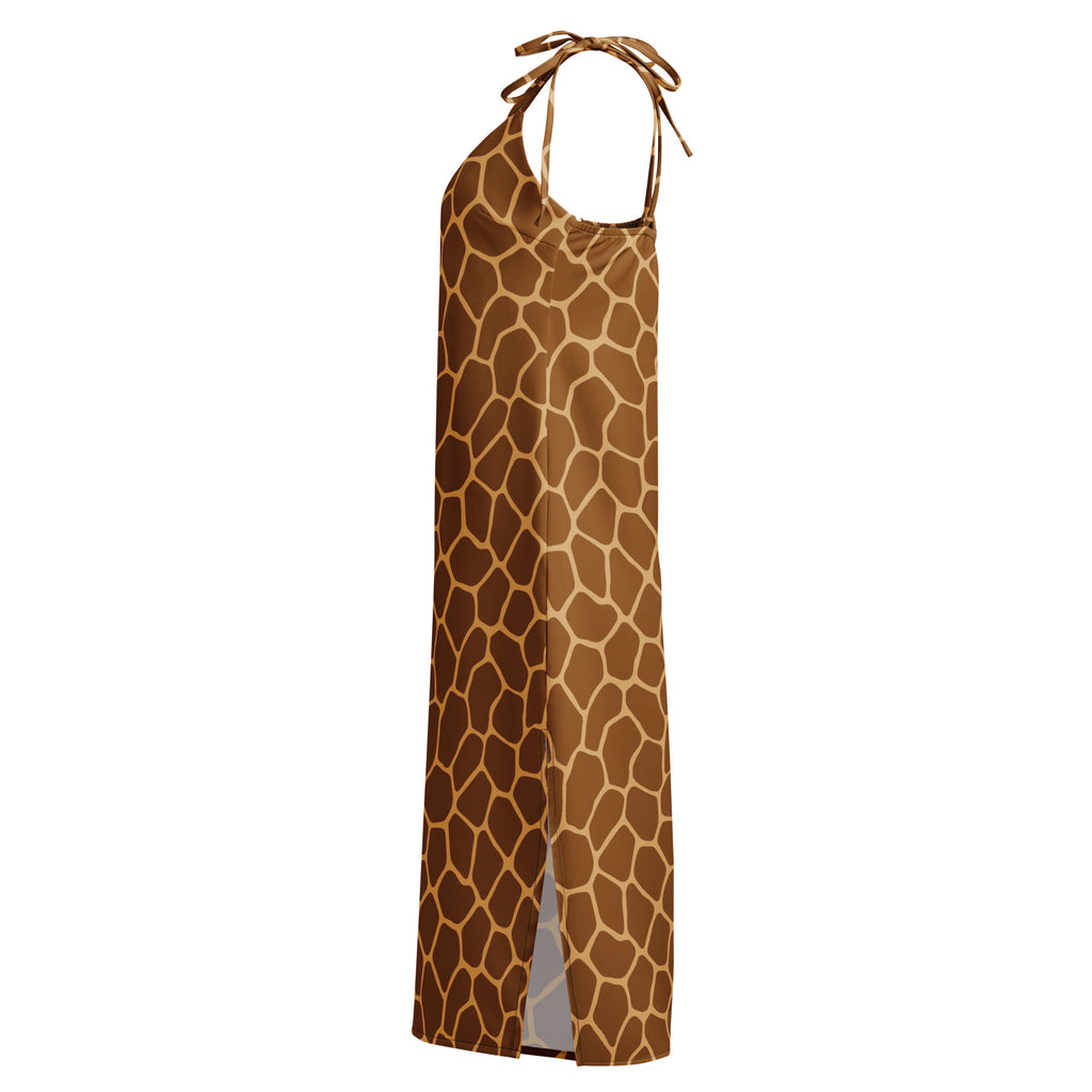 A flowing halter-neck maxi dress in brown and tan giraffe print with adjustable tie straps and built-in bra