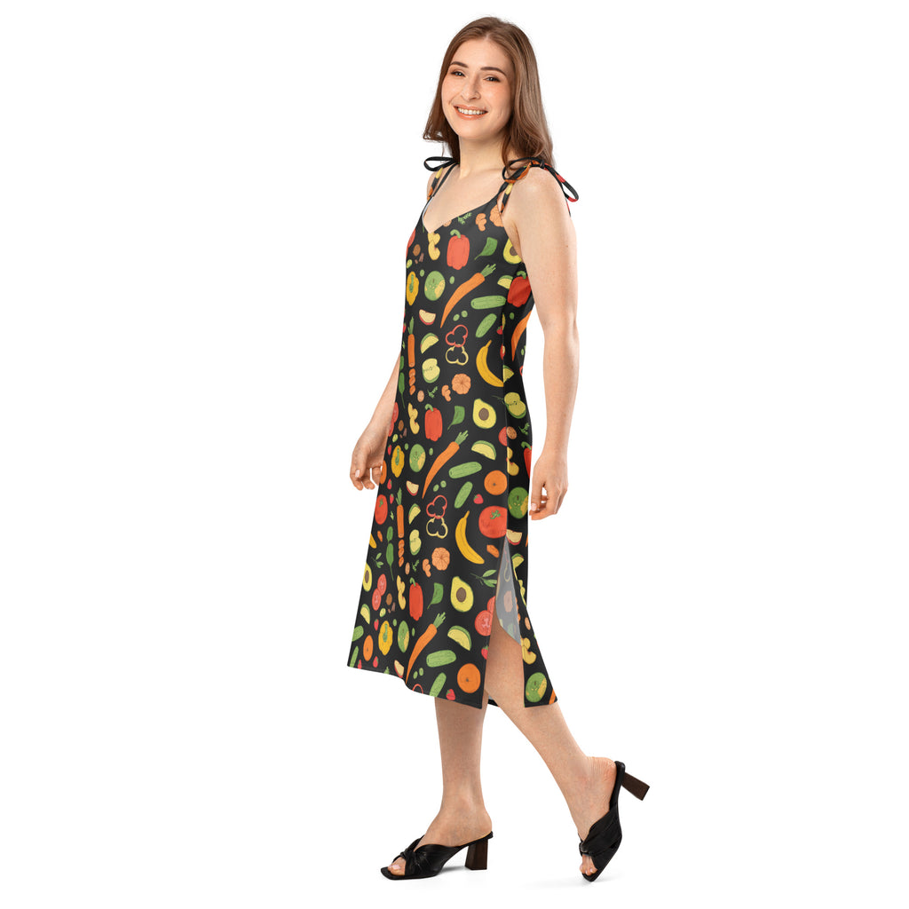 Women’s black sleeveless vegetable and fruit slip dress with vibrant pattern midi length adjustable tie straps and built in bra