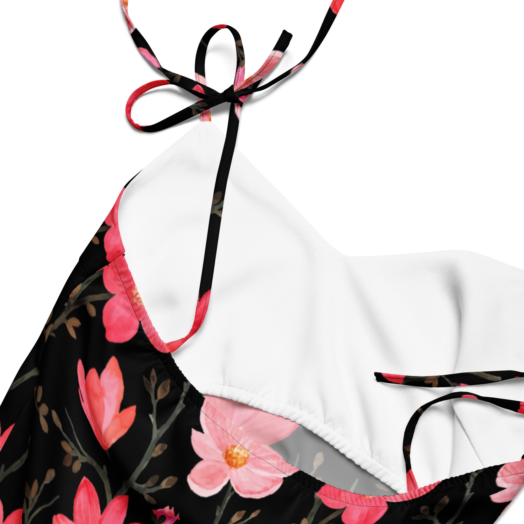 Women’s watercolor pink blossom midi slip dress with adjustable tie straps featuring black and pink floral halter top