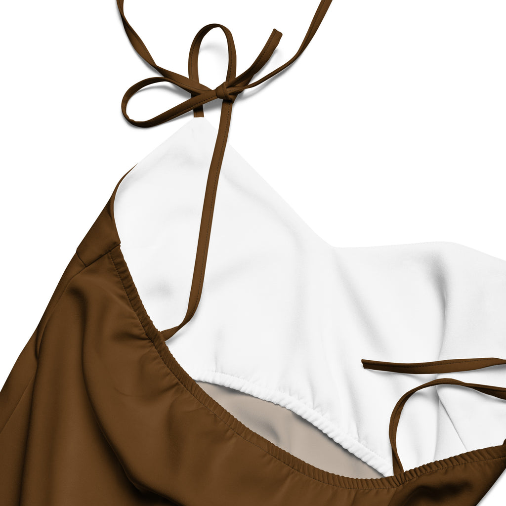Women's brown slip dress with adjustable tie straps and built-in bra