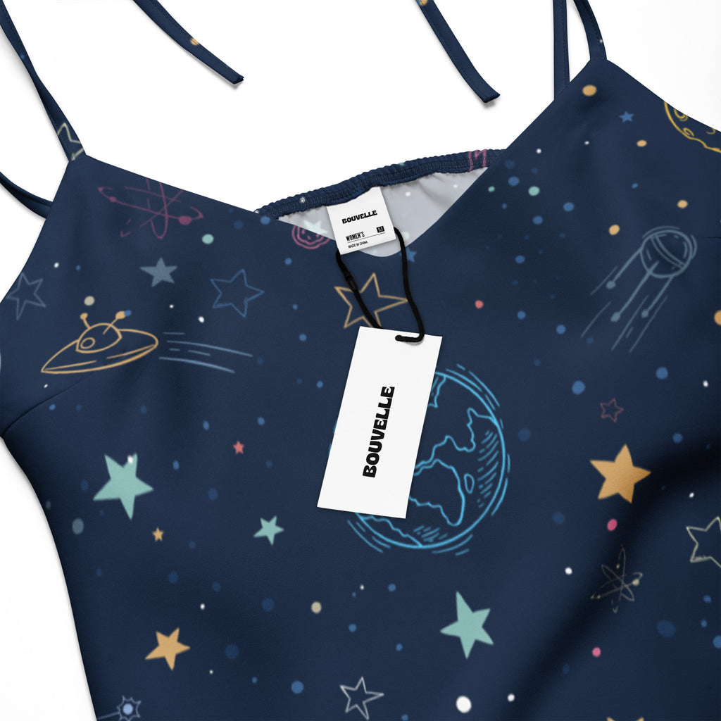 Navy blue dress with space-themed print and Bouvelle tag on a white background