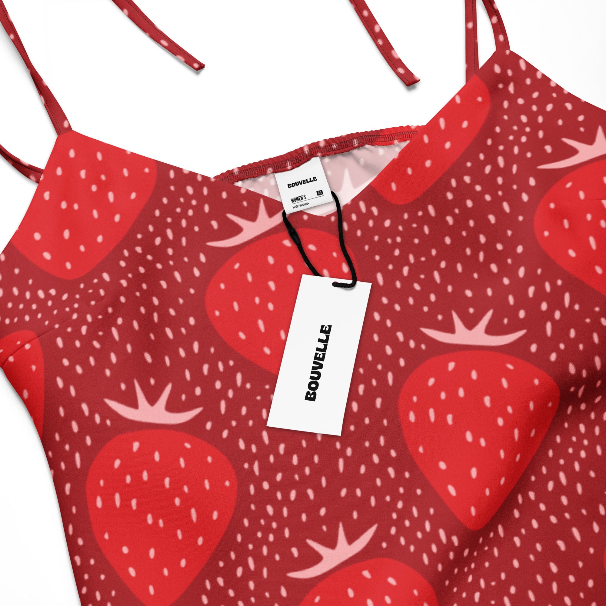 Women’s red strawberry-patterned spaghetti strap top by bouvelle with adjustable tie straps and built-in bra