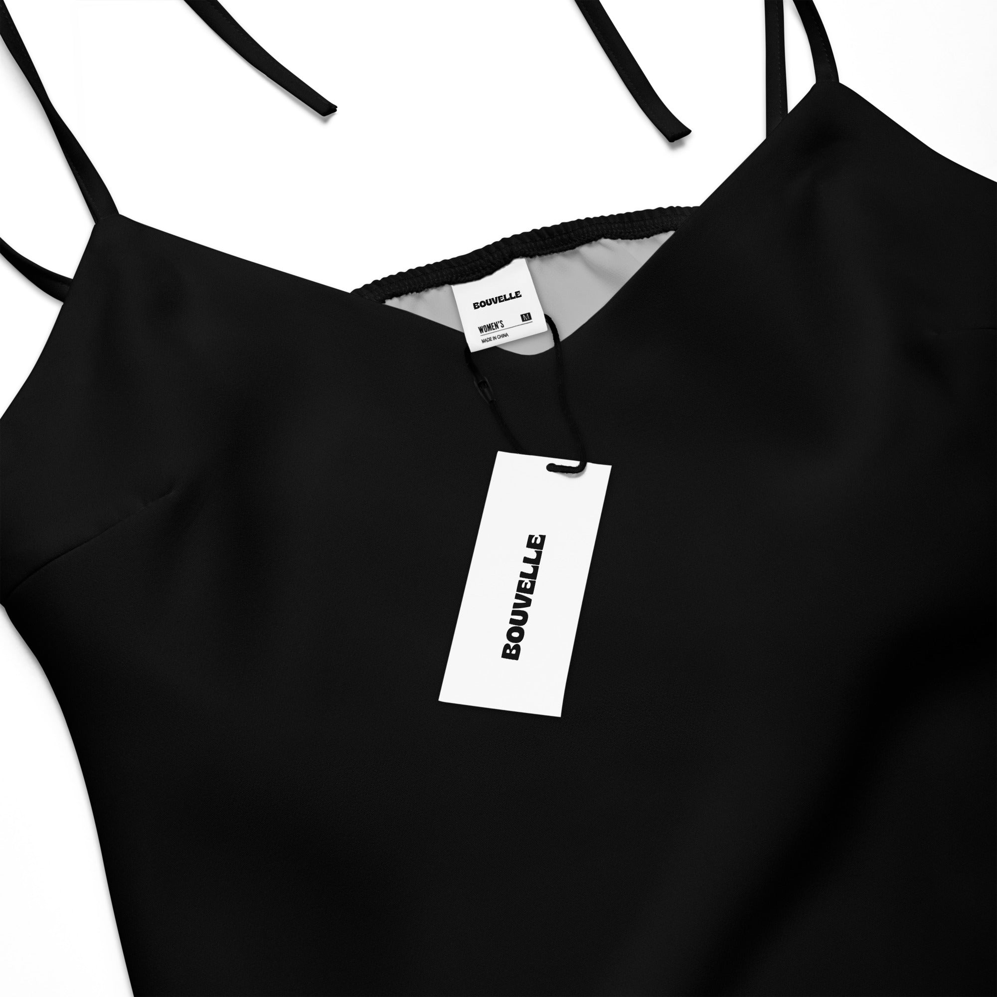 Women's Black Slip Dress - Midi Dress With Adjustable Tie Straps & Built In Bra, close up showing brand tag