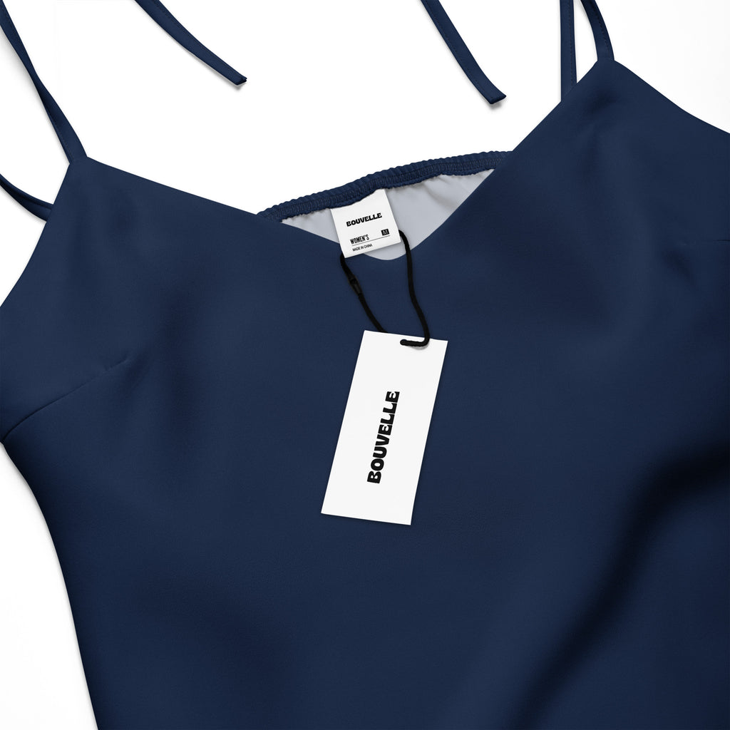 Women's navy blue slip dress by Bouvelle with adjustable tie straps and built-in bra