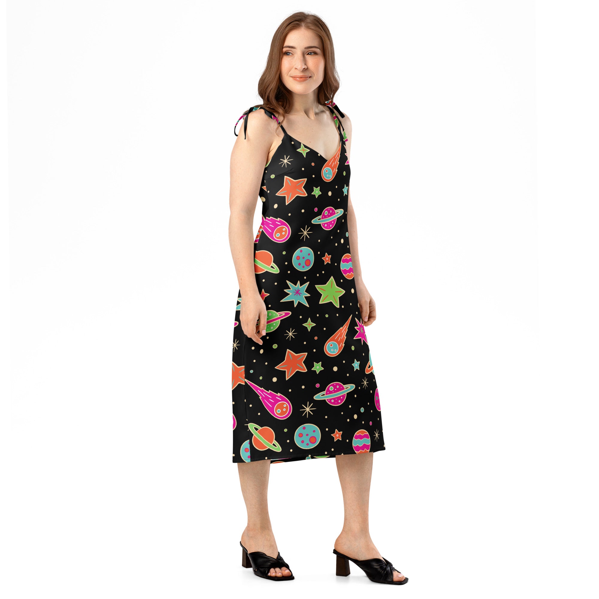 Women’s retro neon space slip midi dress in black glossy fabric with vibrant neon planets stars and comets print