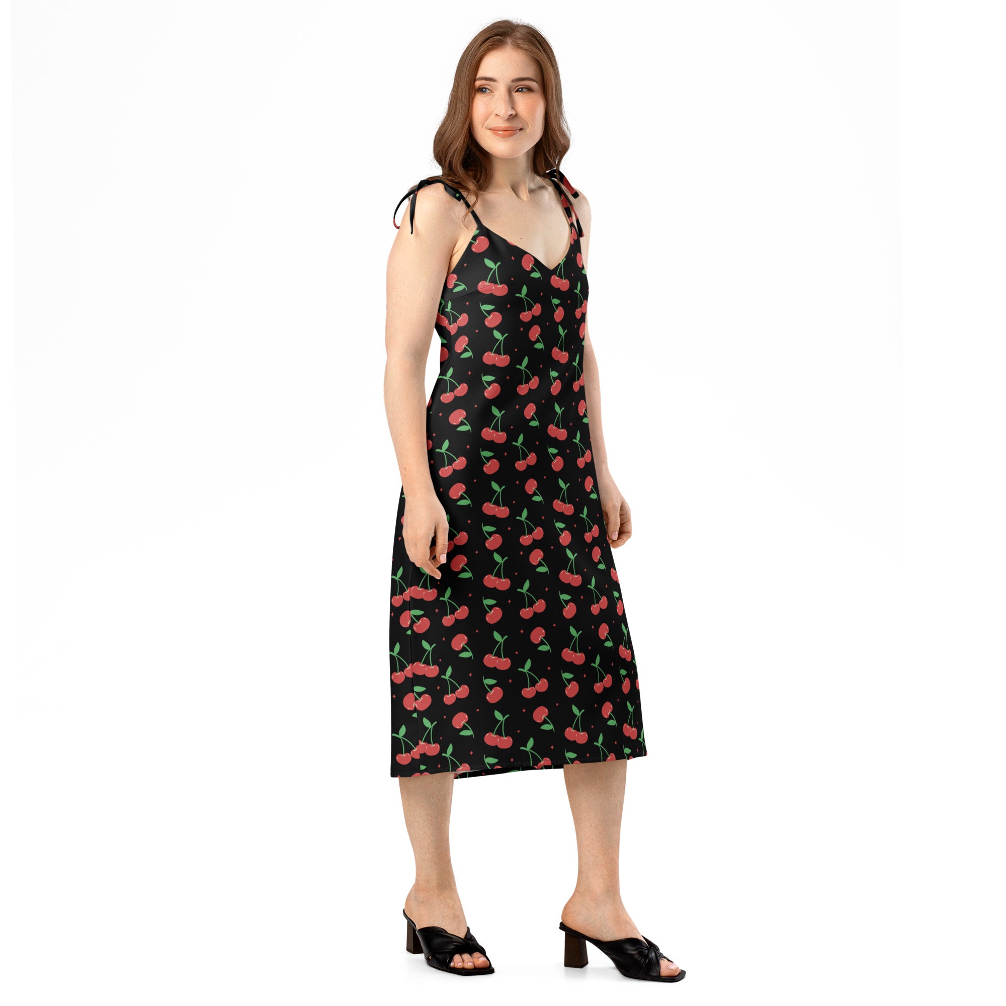 Women’s black cherry print midi slip dress with thin adjustable tie straps and built-in bra front view
