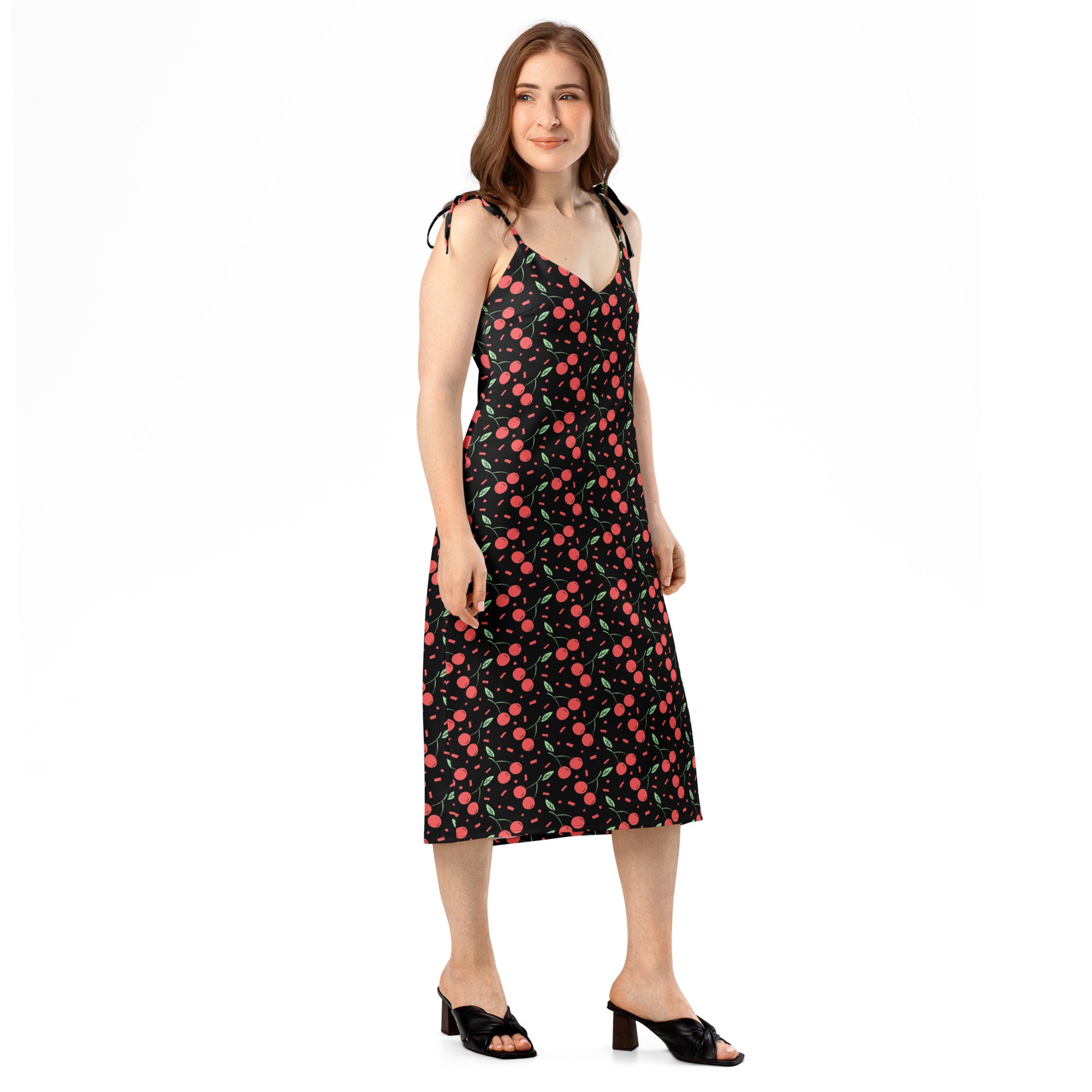 A black cherry-print midi slip dress with adjustable tie-back straps and built-in bra for women