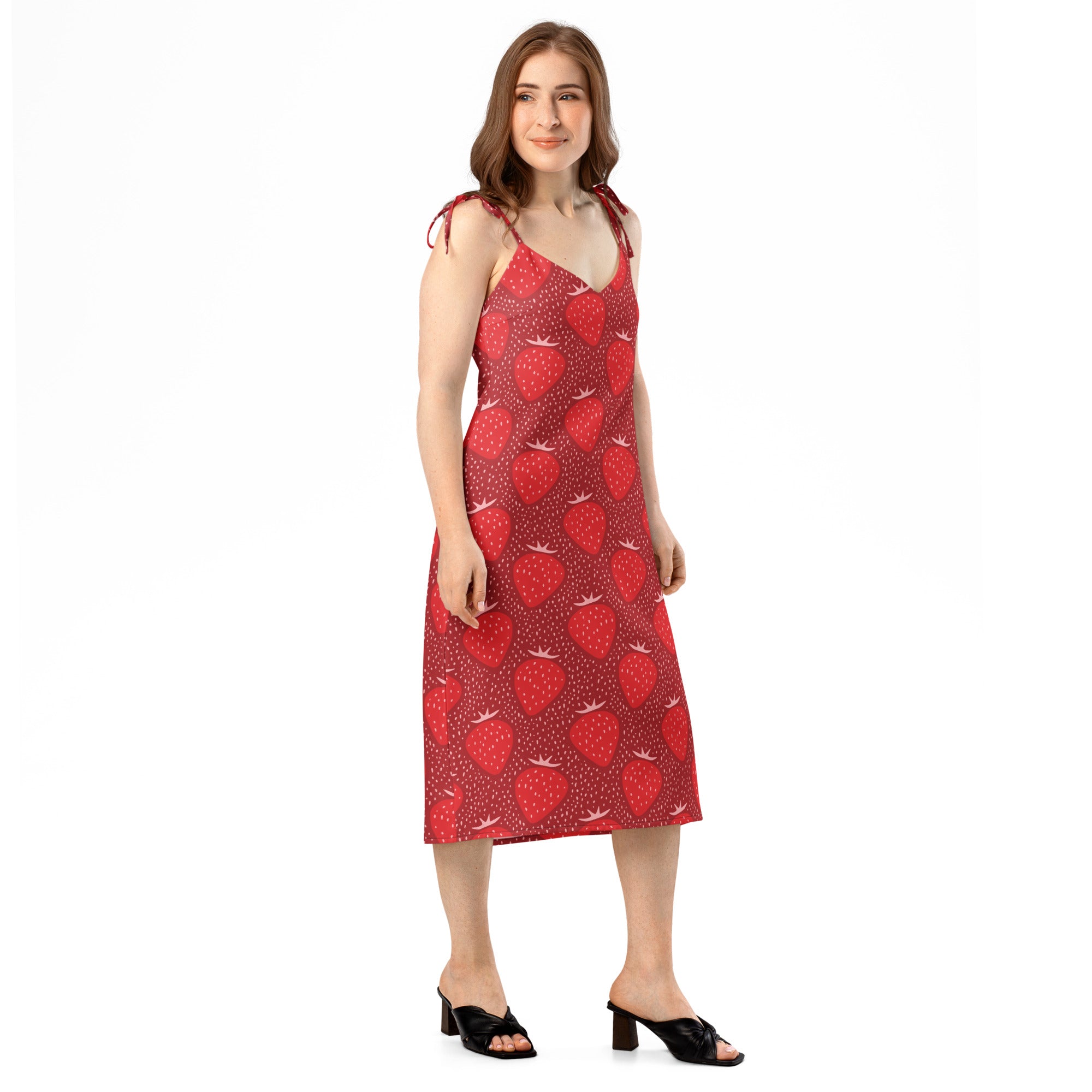 Women’s red strawberry slip midi dress with thin adjustable tie straps and built in bra shown from the back