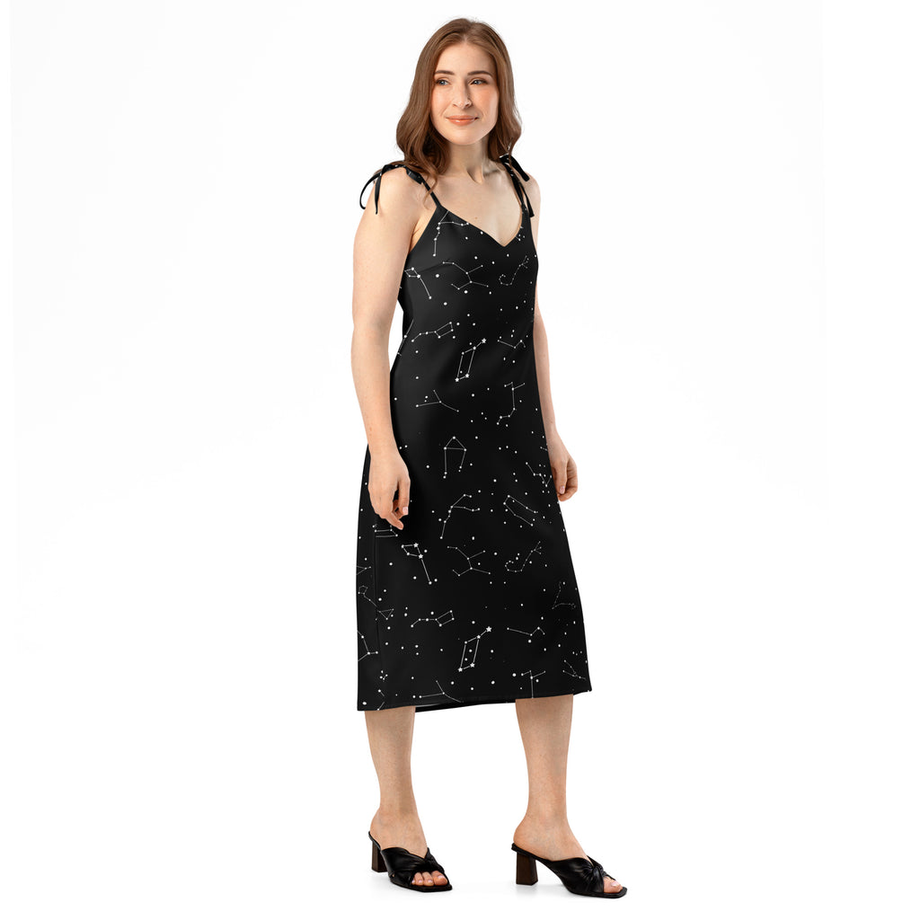 Women’s black midi slip dress with white constellation print adjustable tie straps and built-in bra