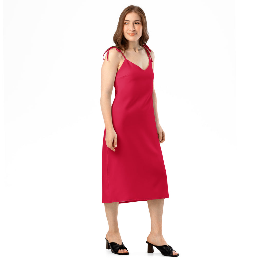 Woman wearing a red dress on a white background
