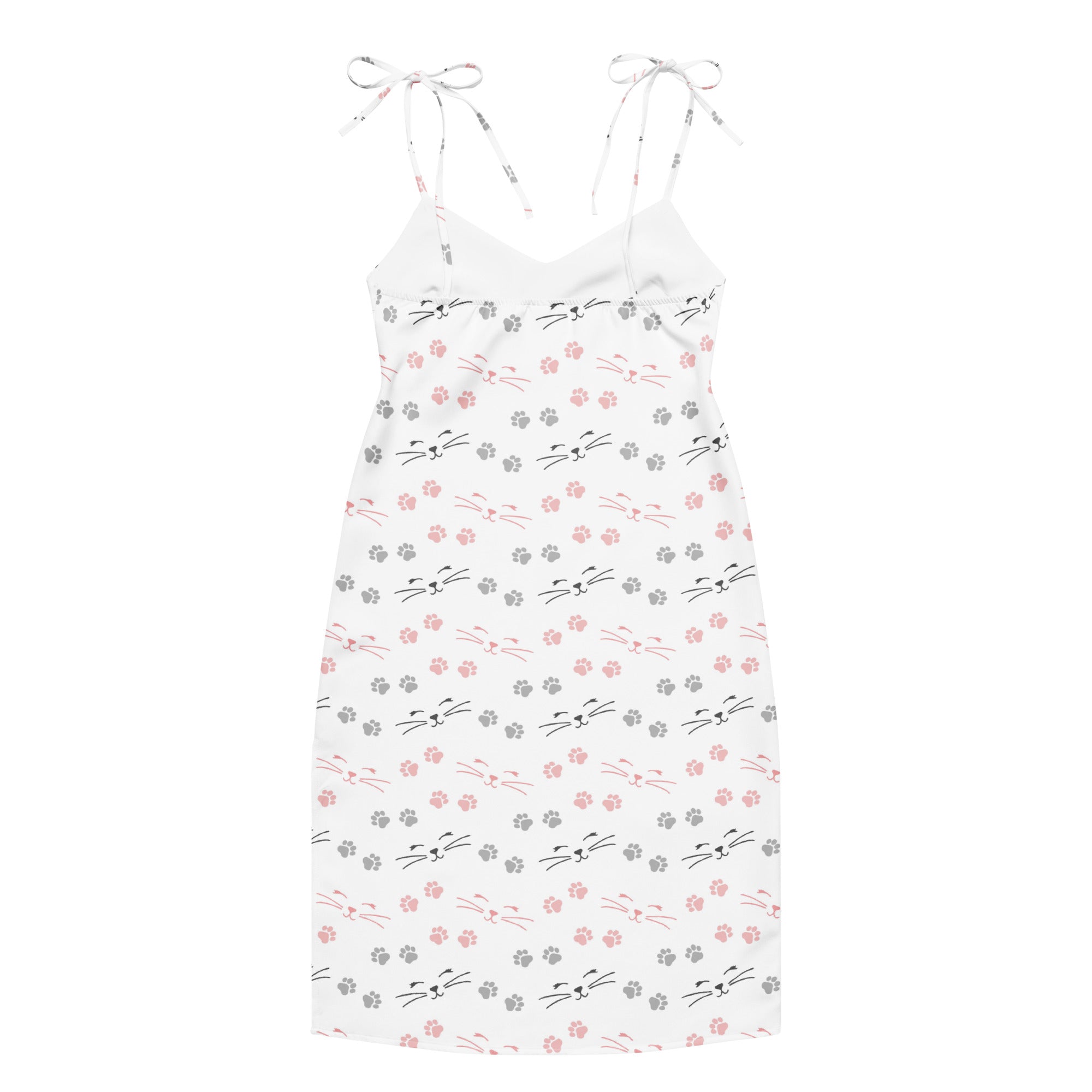 White spaghetti strap midi slip dress with pink and gray cat face and paw print pattern and adjustable tie straps