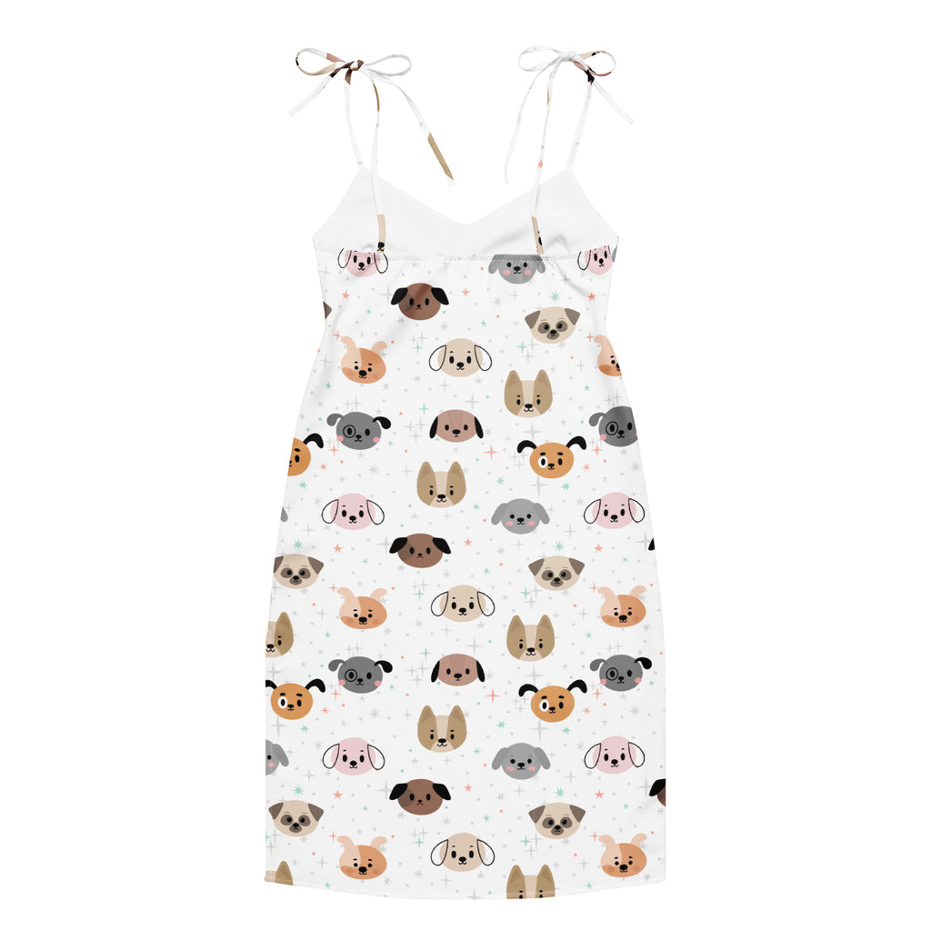 White spaghetti strap midi slip dress with adjustable tie straps and built in bra featuring colorful cartoon dog faces pattern
