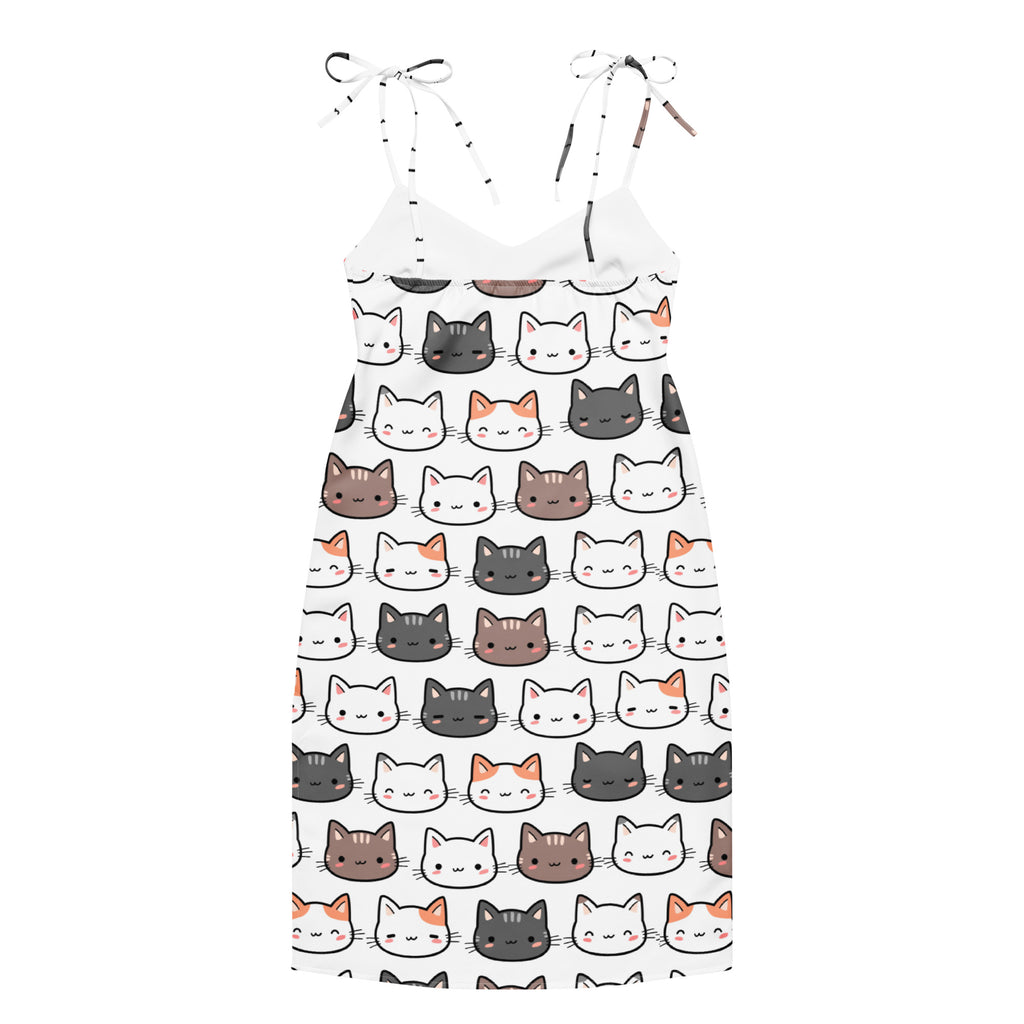 White spaghetti strap midi slip dress with adjustable tie straps and playful multicolor cartoon cat pattern