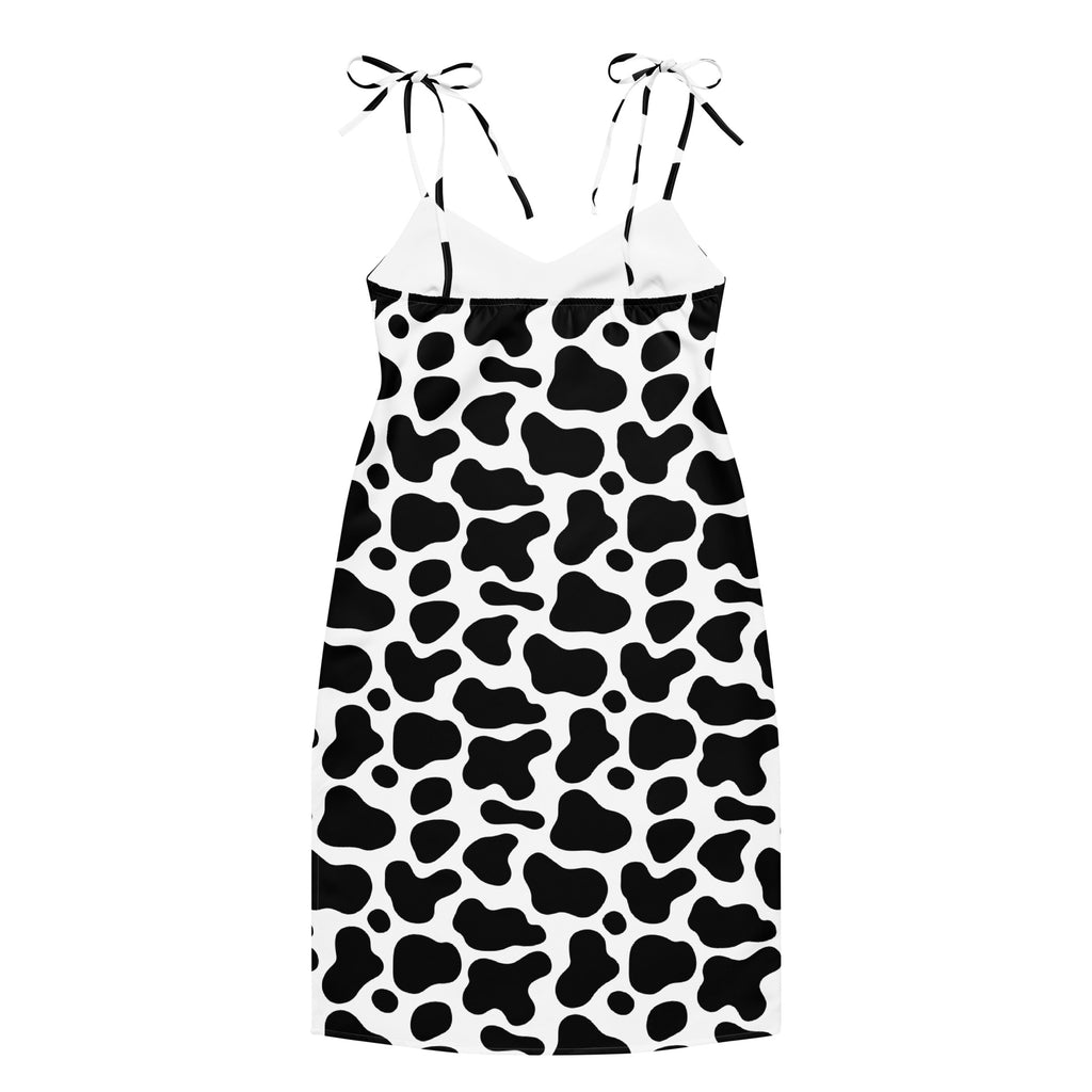 Women’s black and white cow print slip midi dress with adjustable spaghetti tie straps and built in bra