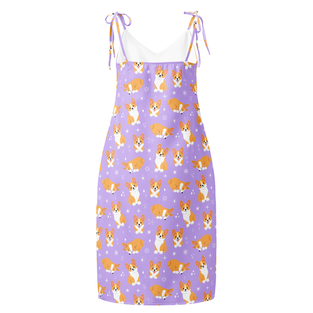 Purple dress with corgi pattern on a white background