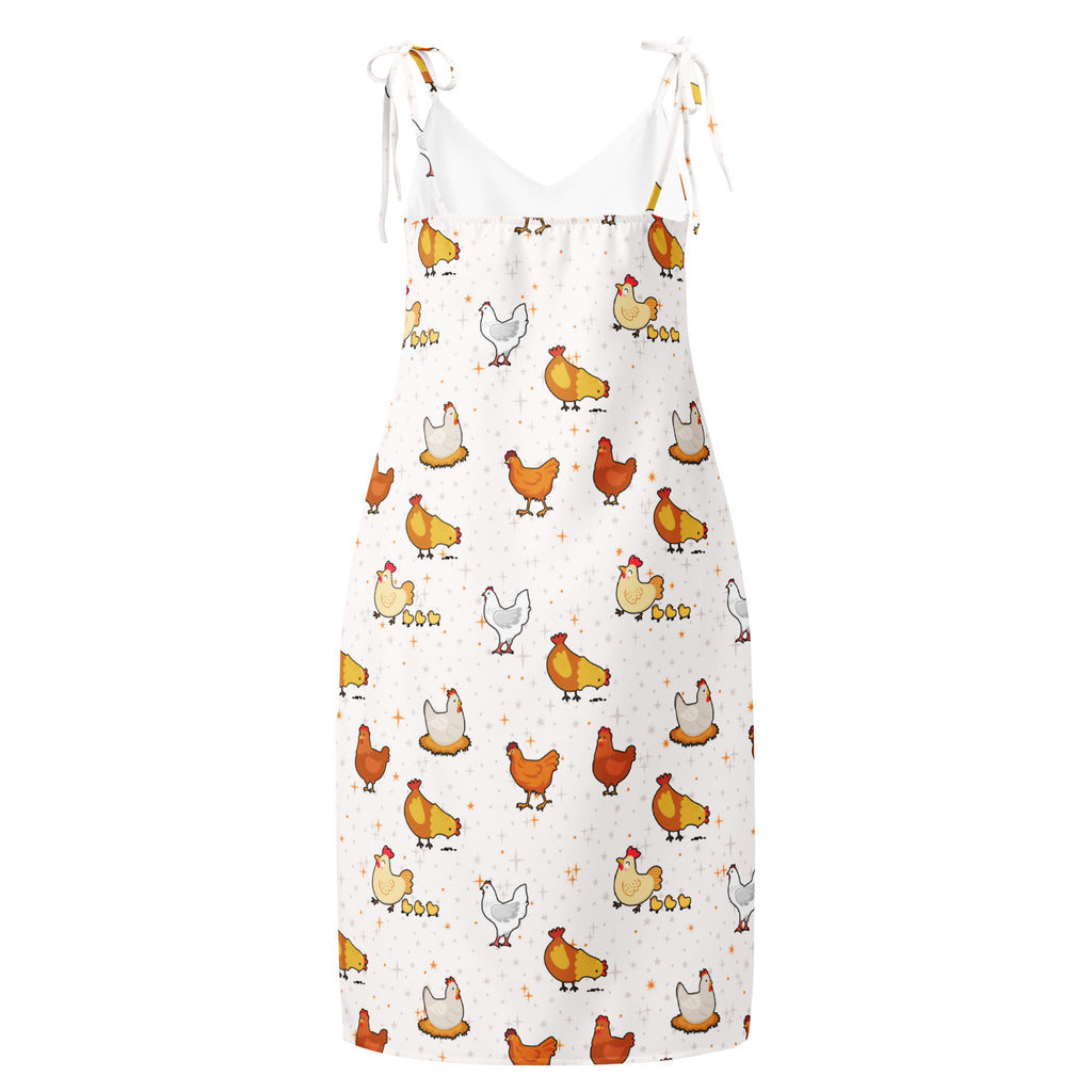 Dress with chicken pattern on a white background