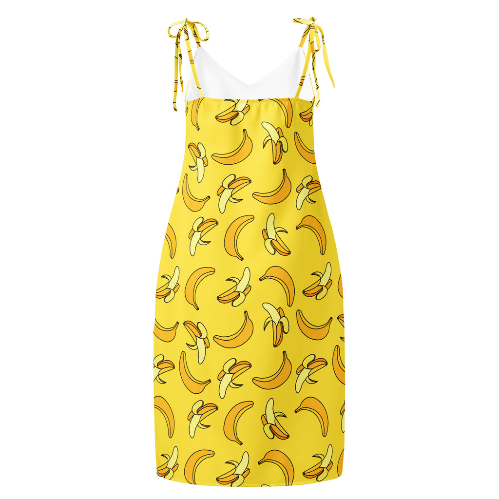 Yellow dress with banana pattern on a white background