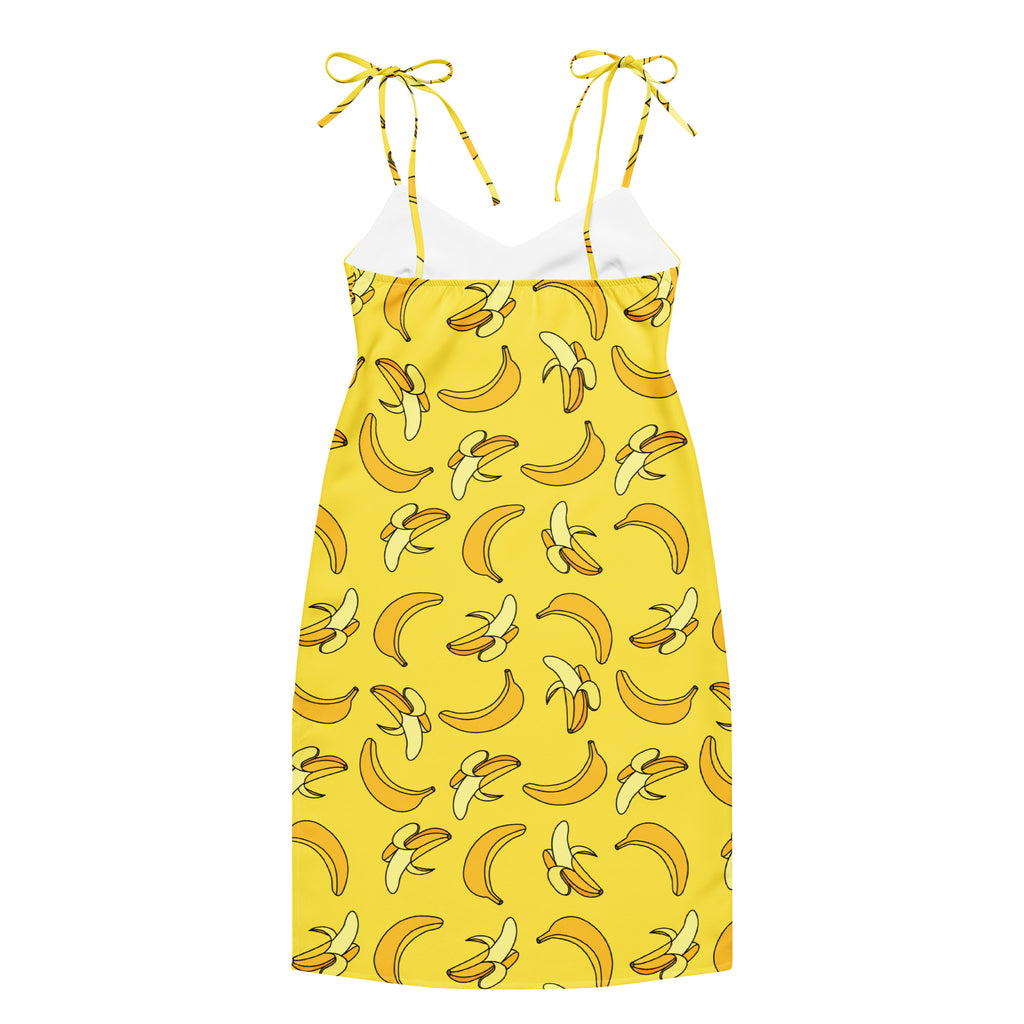 Yellow dress with banana pattern on a white background