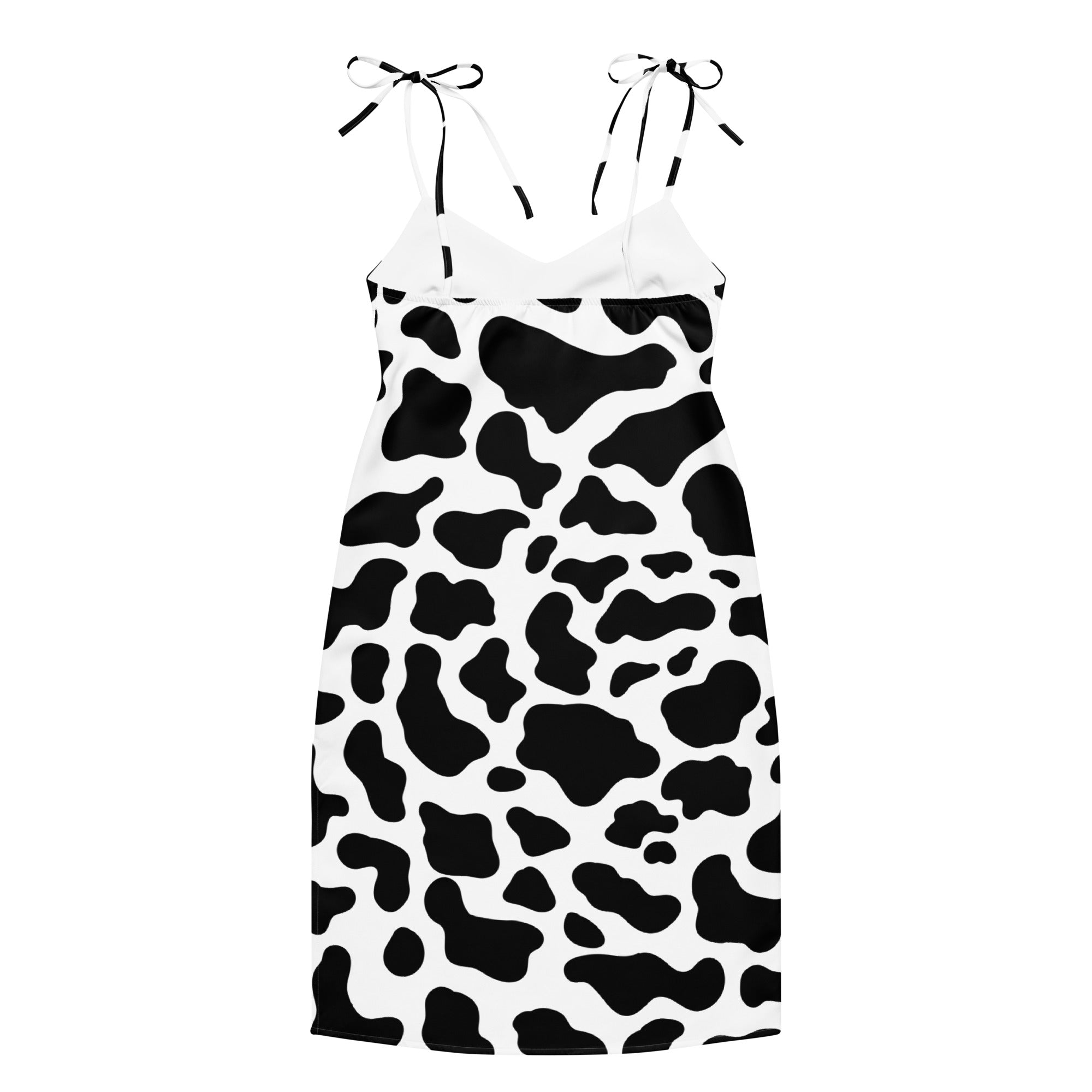 Dress with black and white cow print pattern on a white background