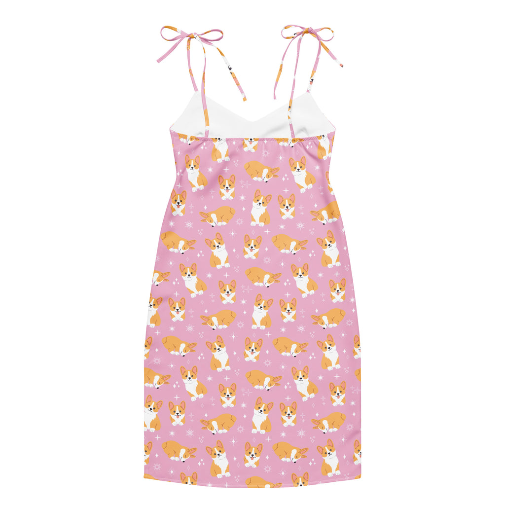 Pink dress with corgi pattern on a white background