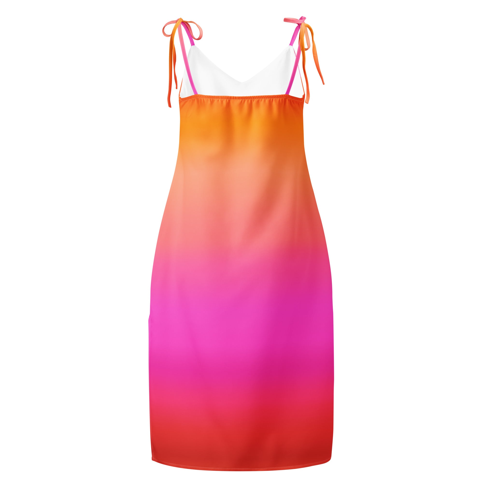 A vibrant sunset ombre midi dress with adjustable tie straps and built in bra in orange pink and red hues