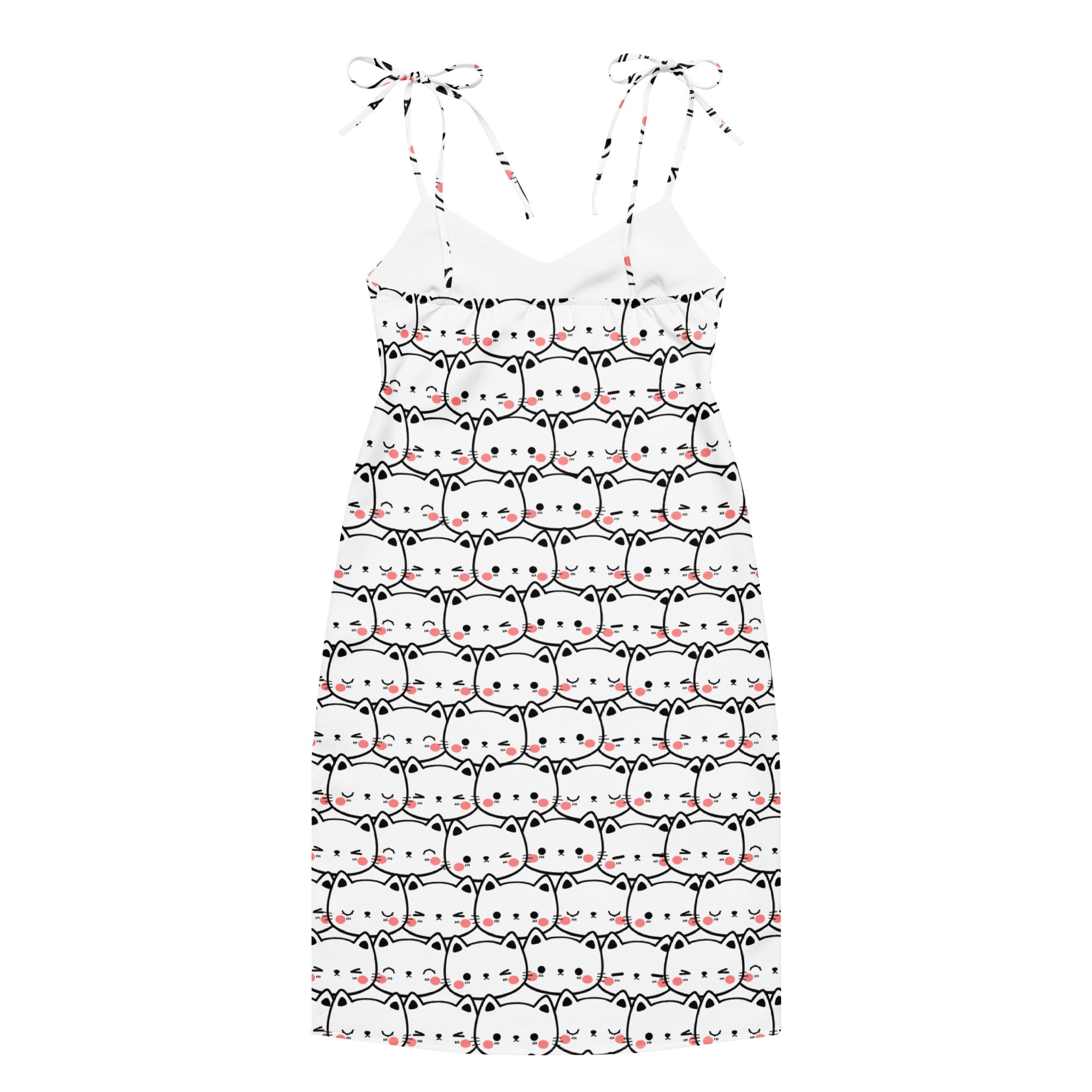 White women’s midi slip dress with adjustable tie straps featuring black outlined cartoon cats with pink cheeks and whiskers
