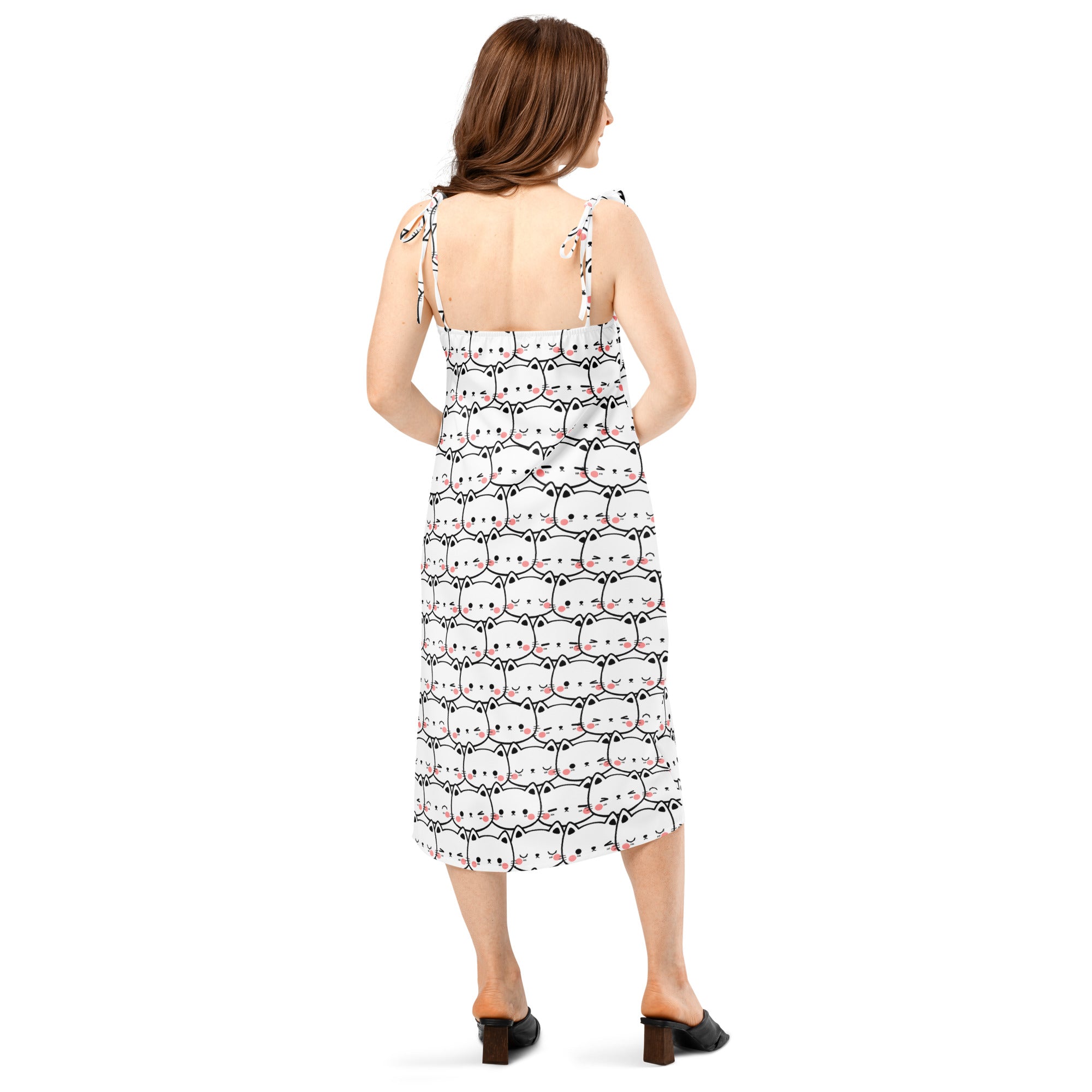 White midi slip dress with black outlined cartoon cats pink accents adjustable tie straps and built in bra back view