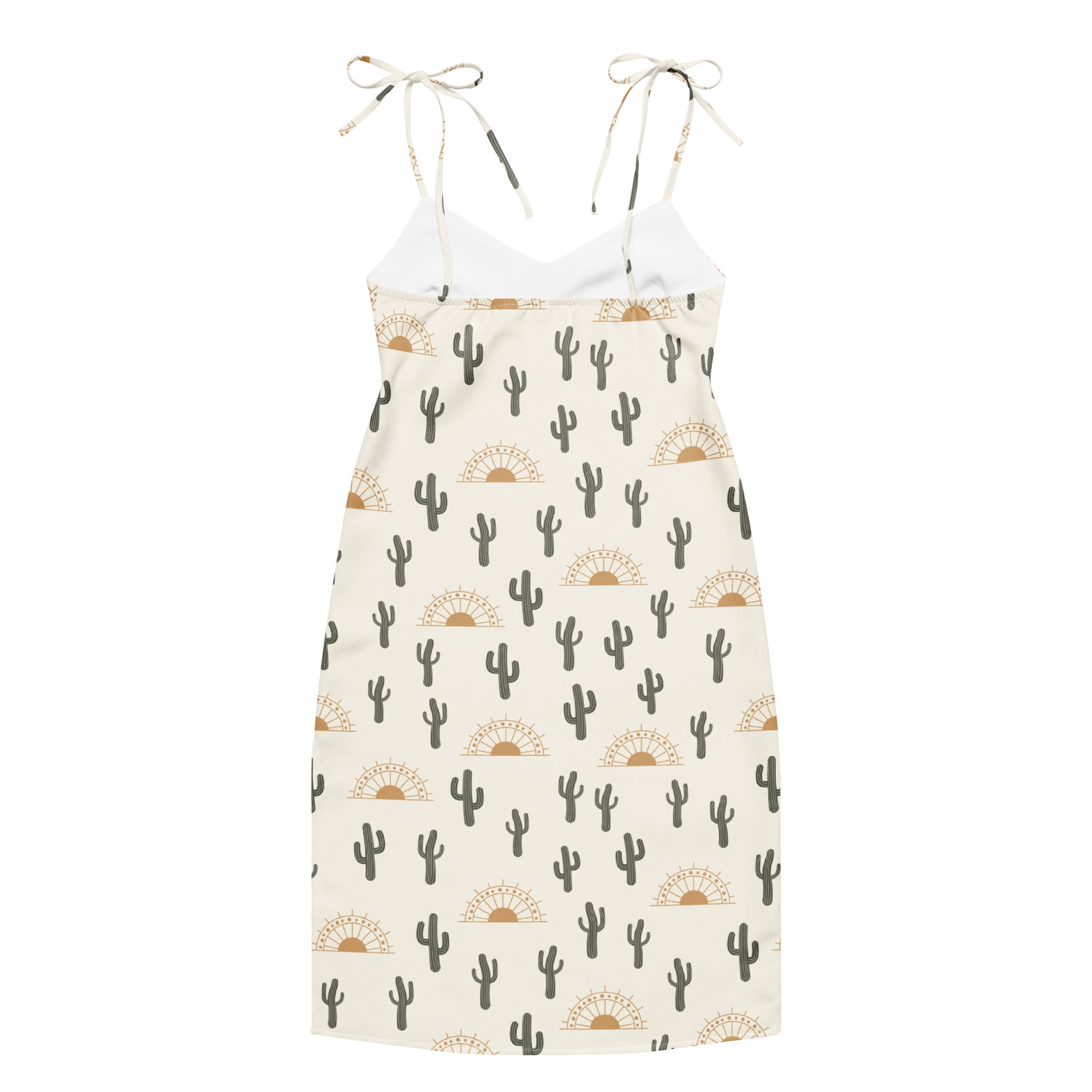 White midi sundress with adjustable tie straps and black cactus and tan sunburst print for desert style wear
