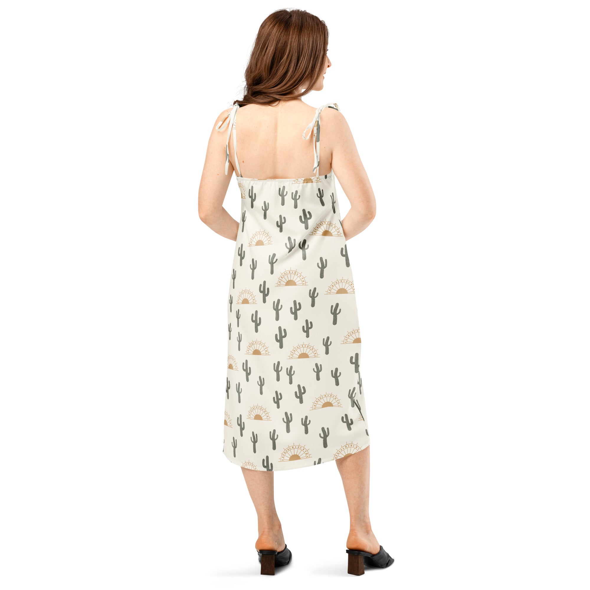 Women off-white midi slip dress with black cactus and gold sun print featuring adjustable tie straps and built in bra