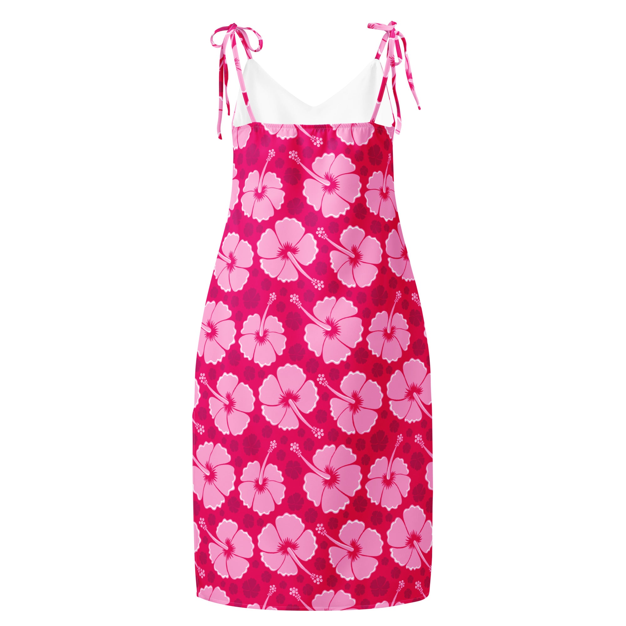 A vibrant pink hibiscus print midi slip dress with adjustable tie straps and white inner lining for women