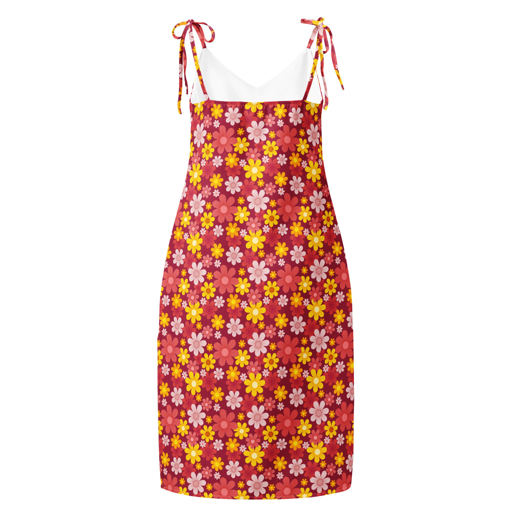 Women’s red floral slip dress with yellow and pink blossoms featuring adjustable tie straps and built in bra