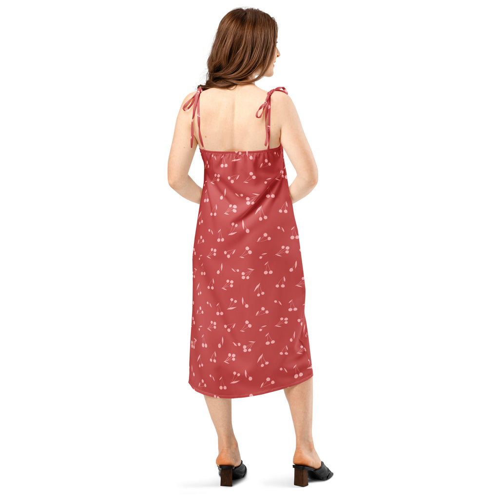 Women’s red satin cherry print midi slip dress with adjustable tie straps and built in bra