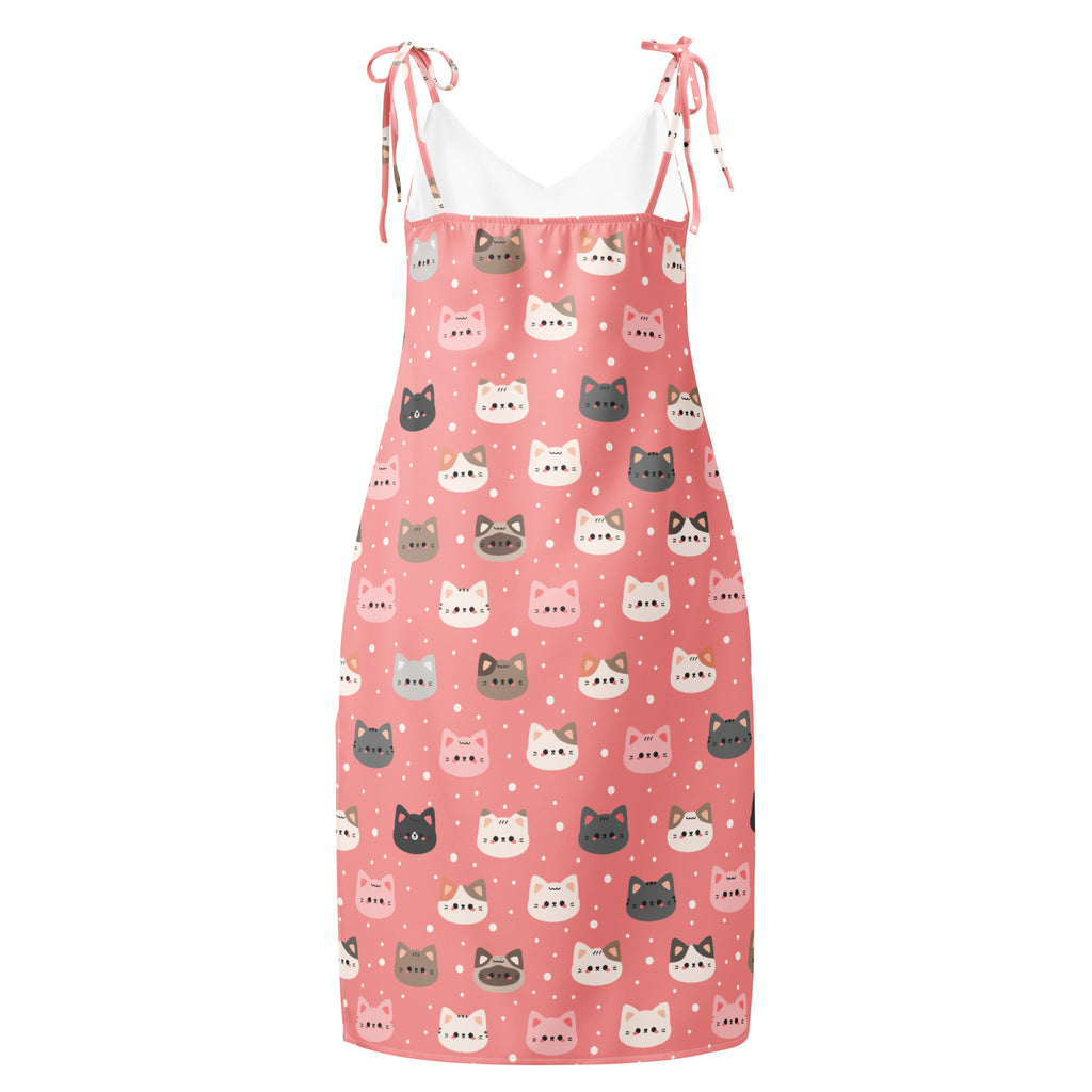 Women’s pink midi slip dress with adjustable tie straps and colorful cartoon cat pattern with built in bra