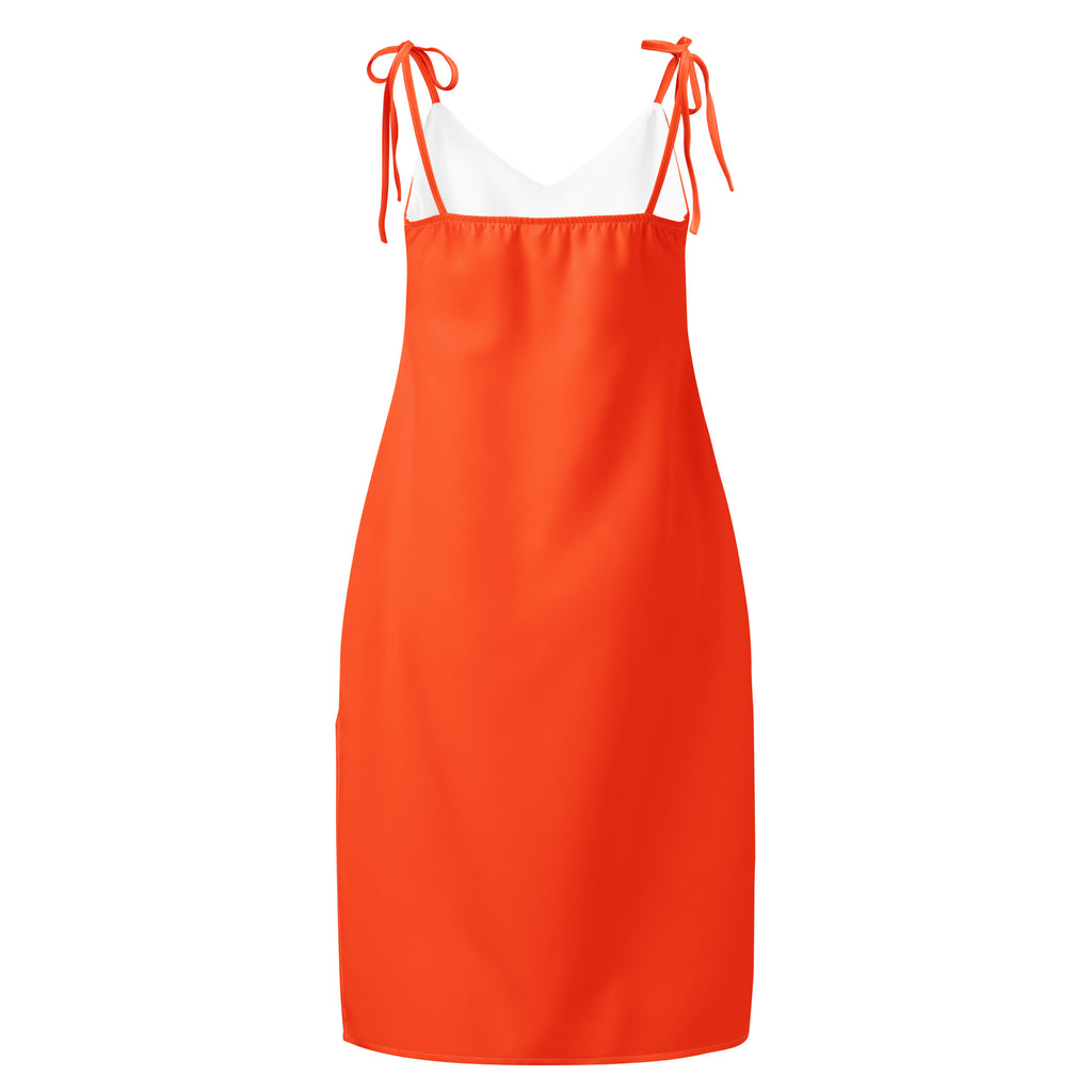 Slip dress in bright orange with adjustable tie straps and built-in bra.