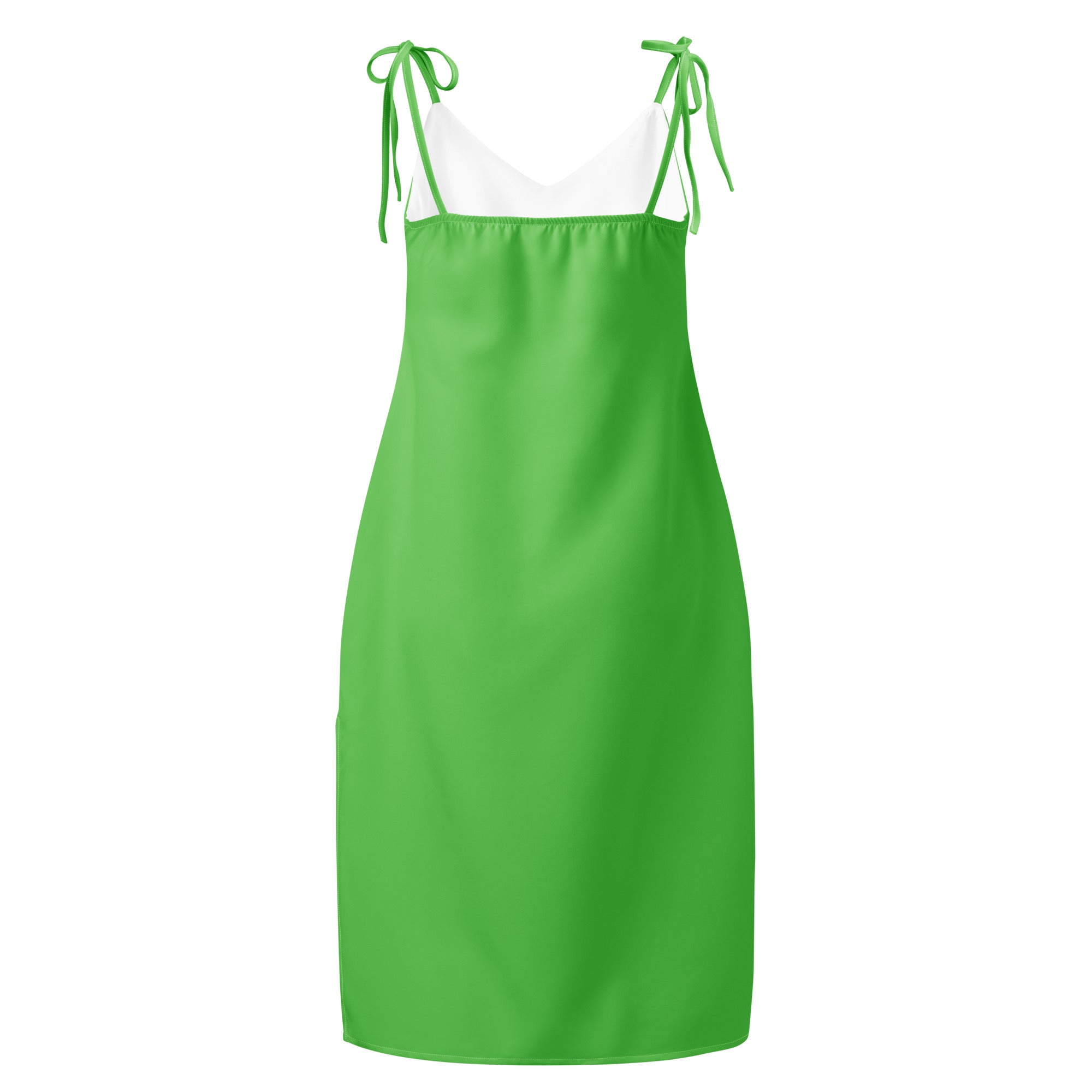 Women's green slip dress with adjustable tie straps and white inner lining.