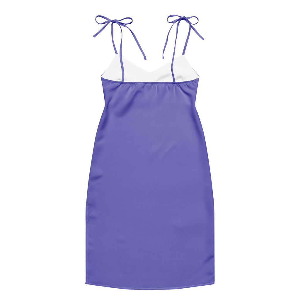 Purple slip dress with white trim on a white background