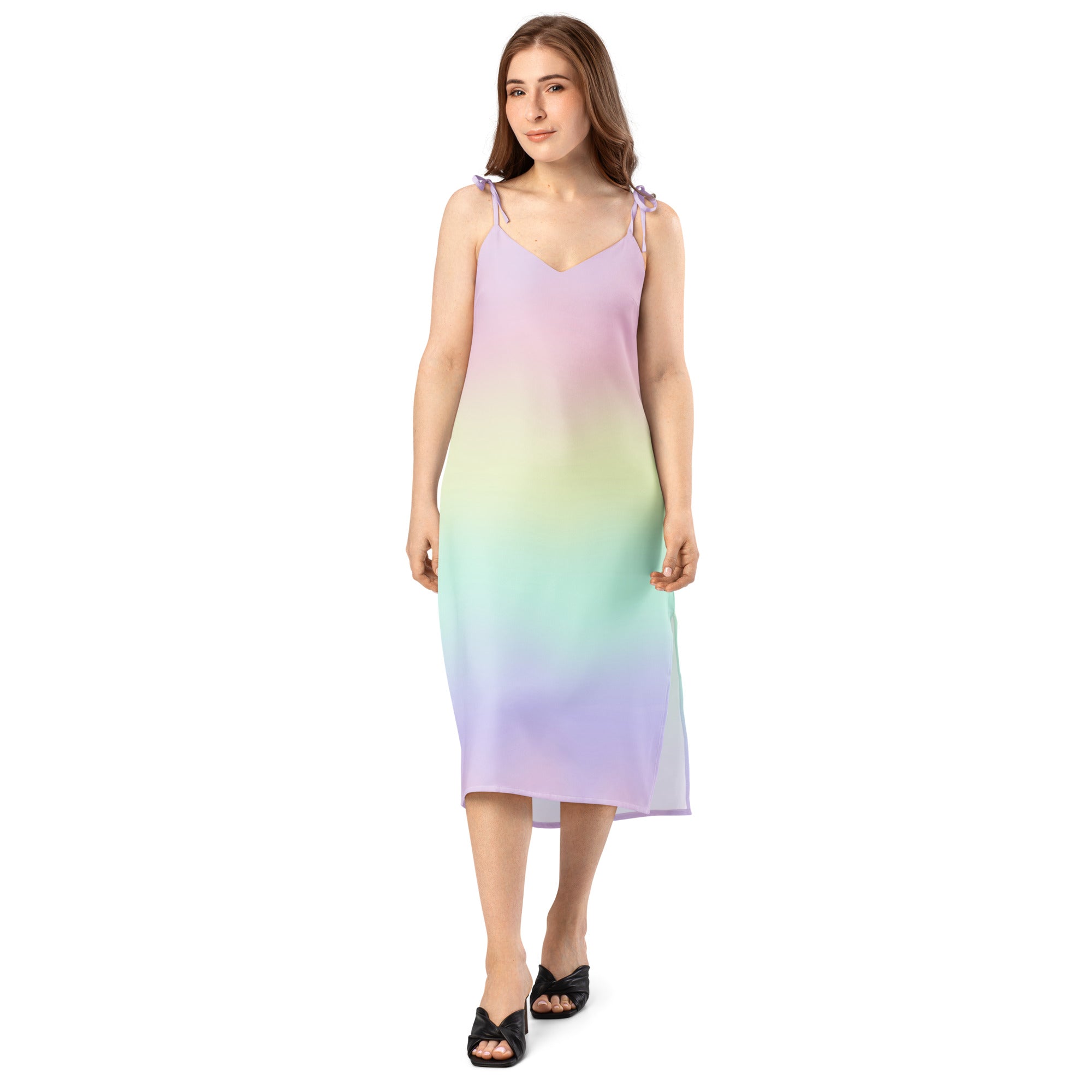 A flowing sleeveless midi dress with adjustable tie straps and built-in bra in pastel gradient from lavender to mint green