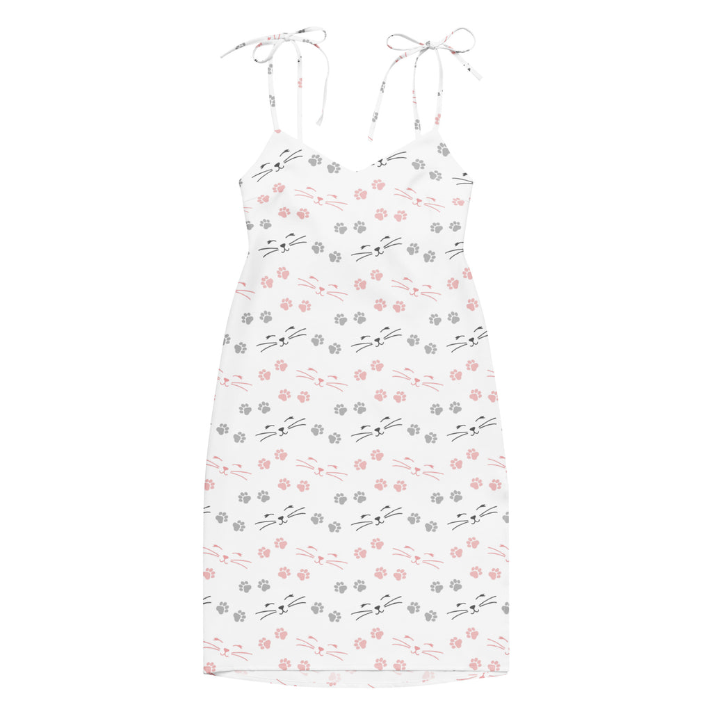 White spaghetti strap midi slip dress with adjustable tie straps and cat paw print pattern in pink and gray
