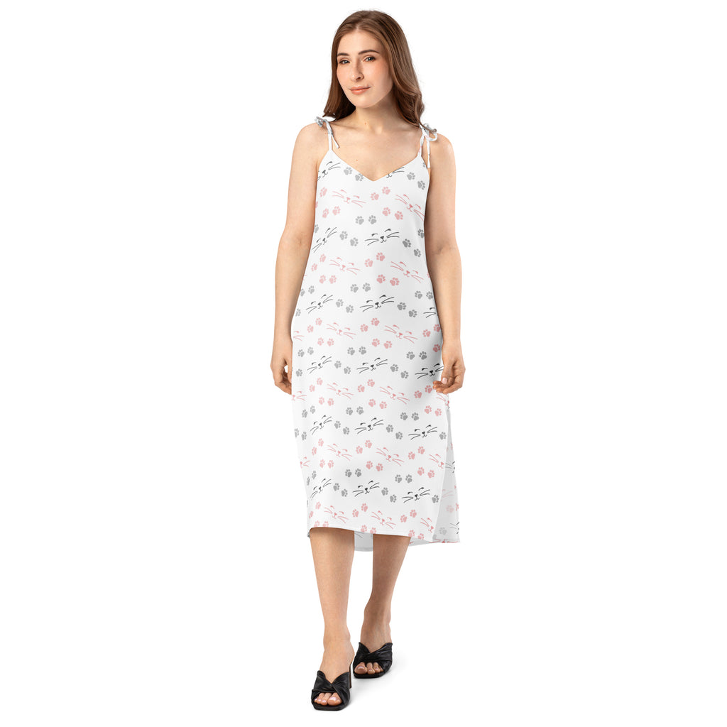 White sleeveless midi dress with adjustable tie straps and pink and gray cat silhouette print for women