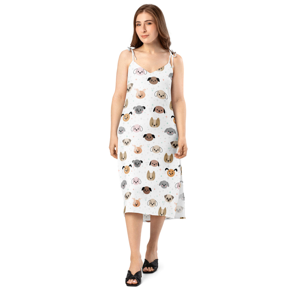 Women’s white spaghetti strap dog face slip midi dress with adjustable tie straps and built in bra featuring colorful cartoon dogs