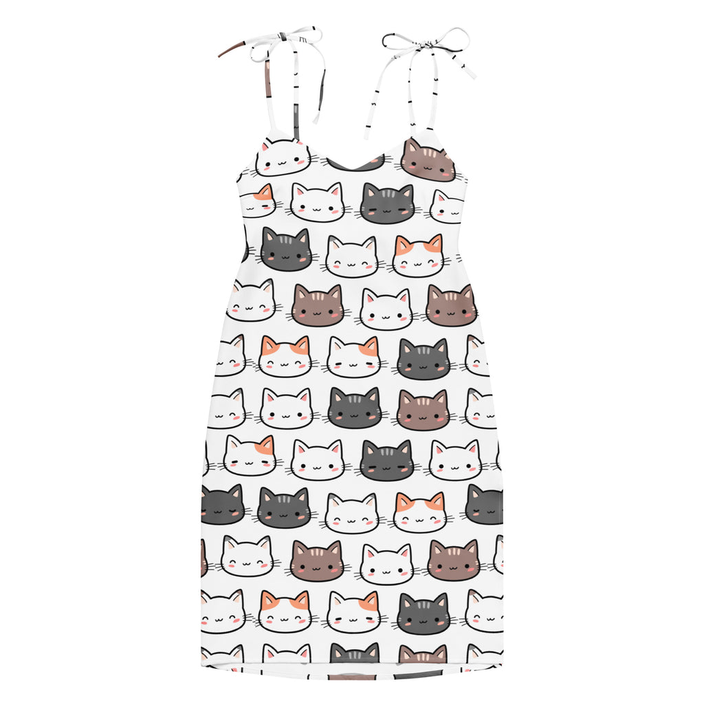 White spaghetti strap slip dress with playful multicolor cartoon cat pattern and adjustable tie straps and built in bra